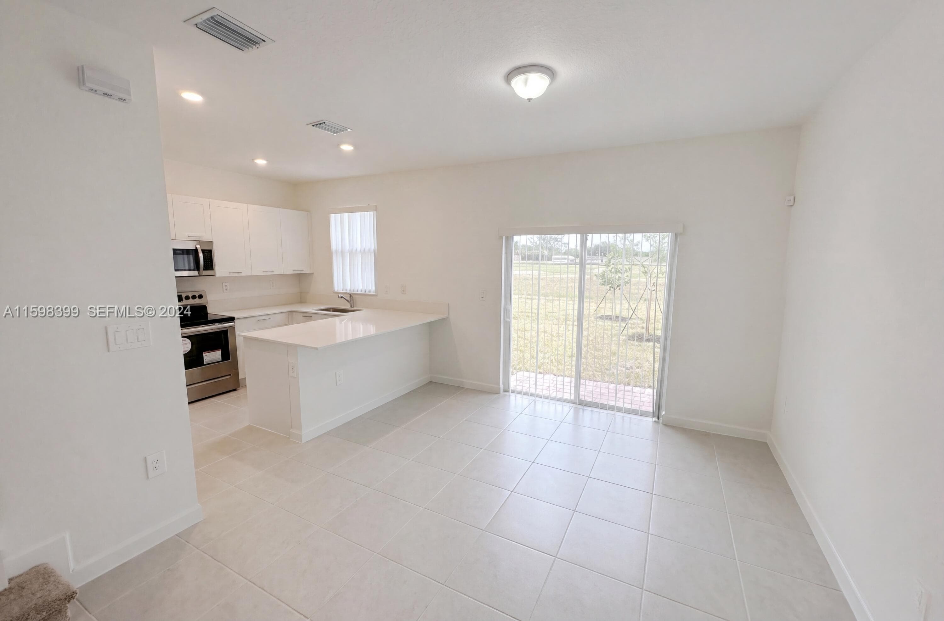 12432 NW 23rd Court 12432, Miami, FL 33167 — photo 3 of 31