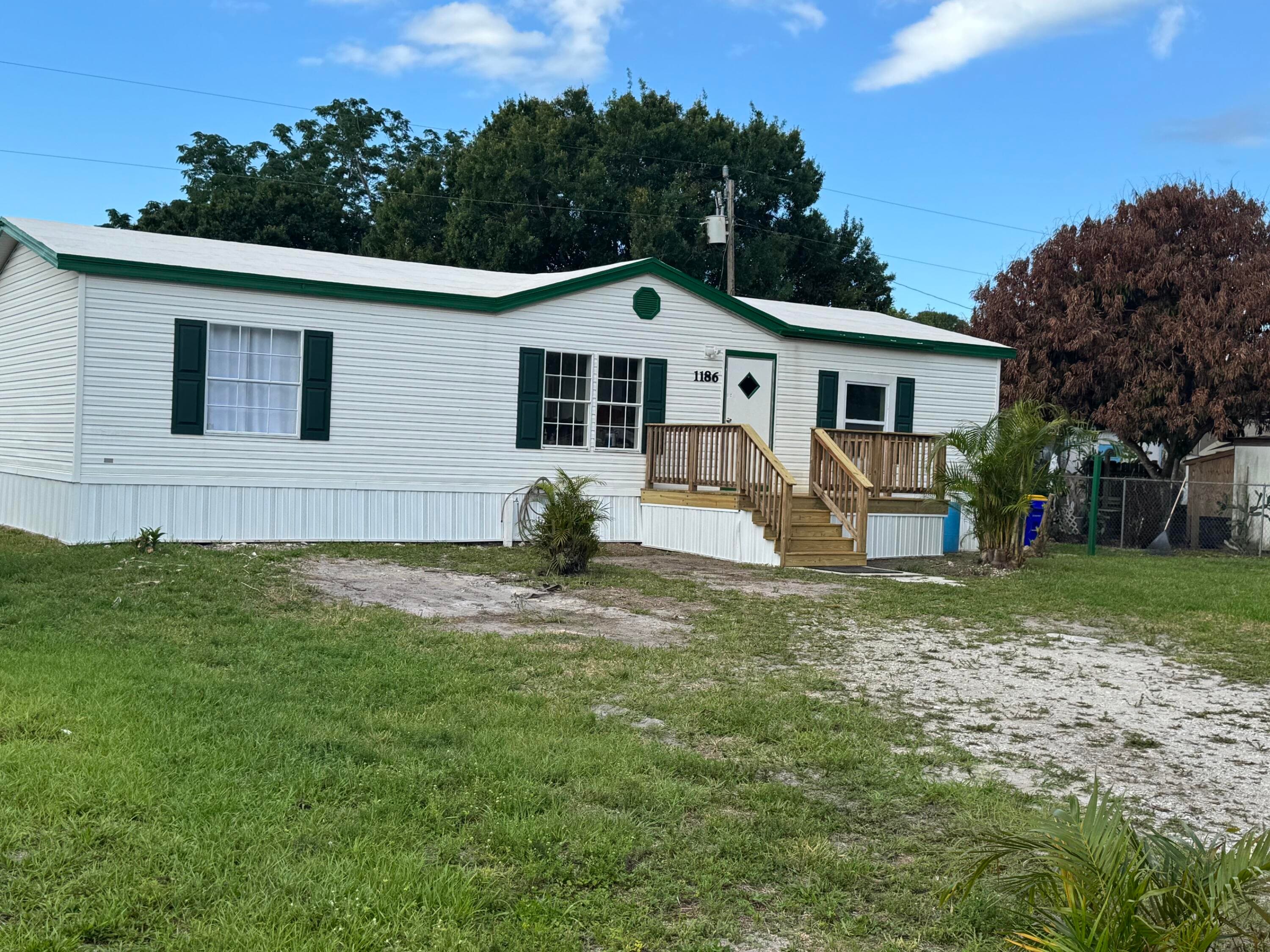 1186 SW Tropical Terrace, Stuart, FL 34997 — photo 1 of 27