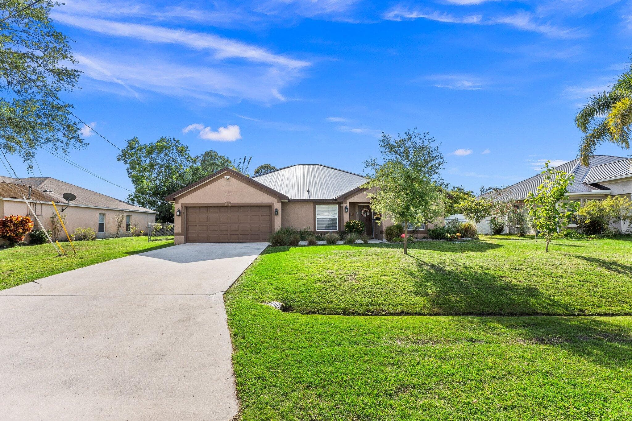 6610 NW Omega Road, Port St. Lucie, FL 34983 — photo 2 of 34