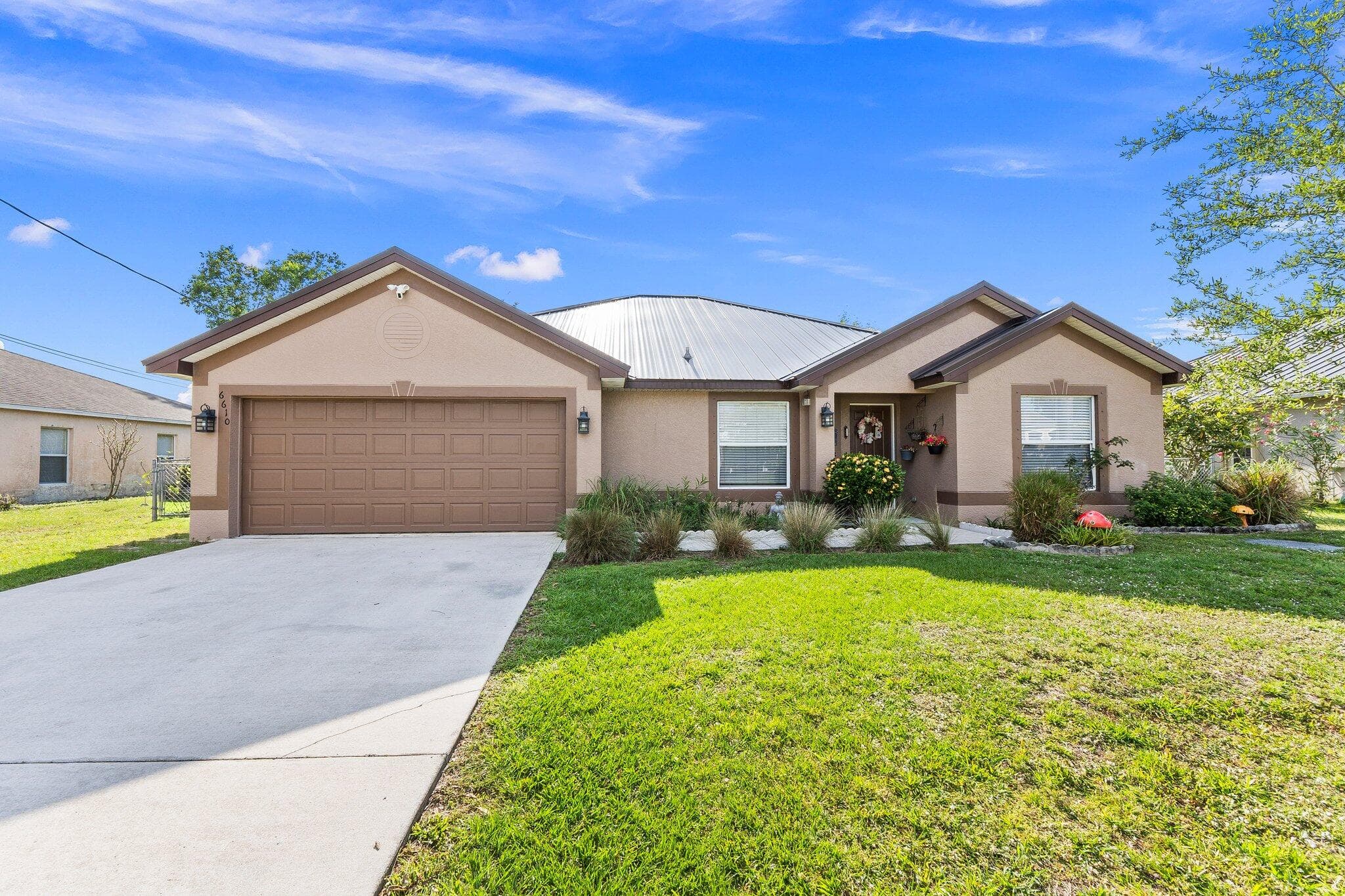 6610 NW Omega Road, Port St. Lucie, FL 34983 — photo 1 of 34