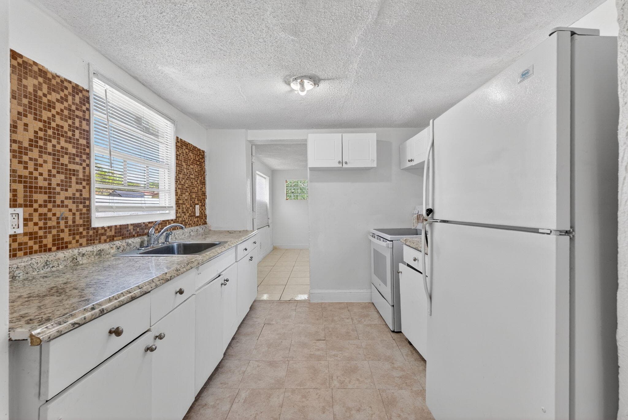2917 NW 7th Court 2917, Fort Lauderdale, FL 33311 — photo 8 of 28