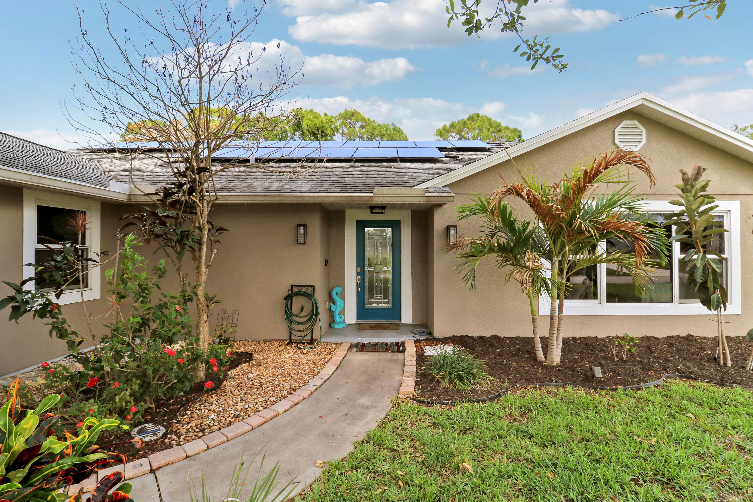 1881 SW Taurus Lane, Port St. Lucie, FL 34984 — photo 1 of 43