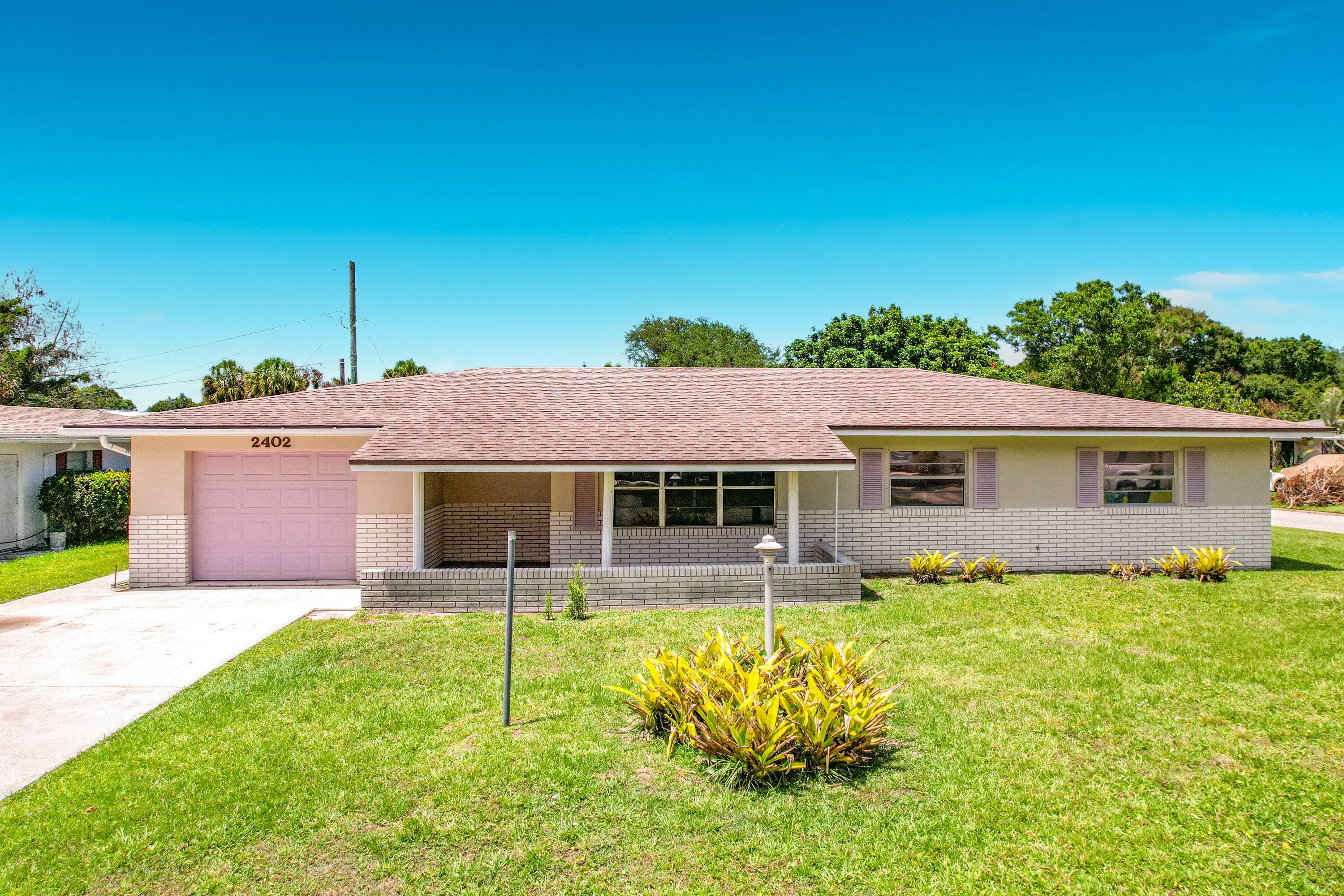 2402 Newport Drive, Fort Pierce, FL 34982 — photo 1 of 60