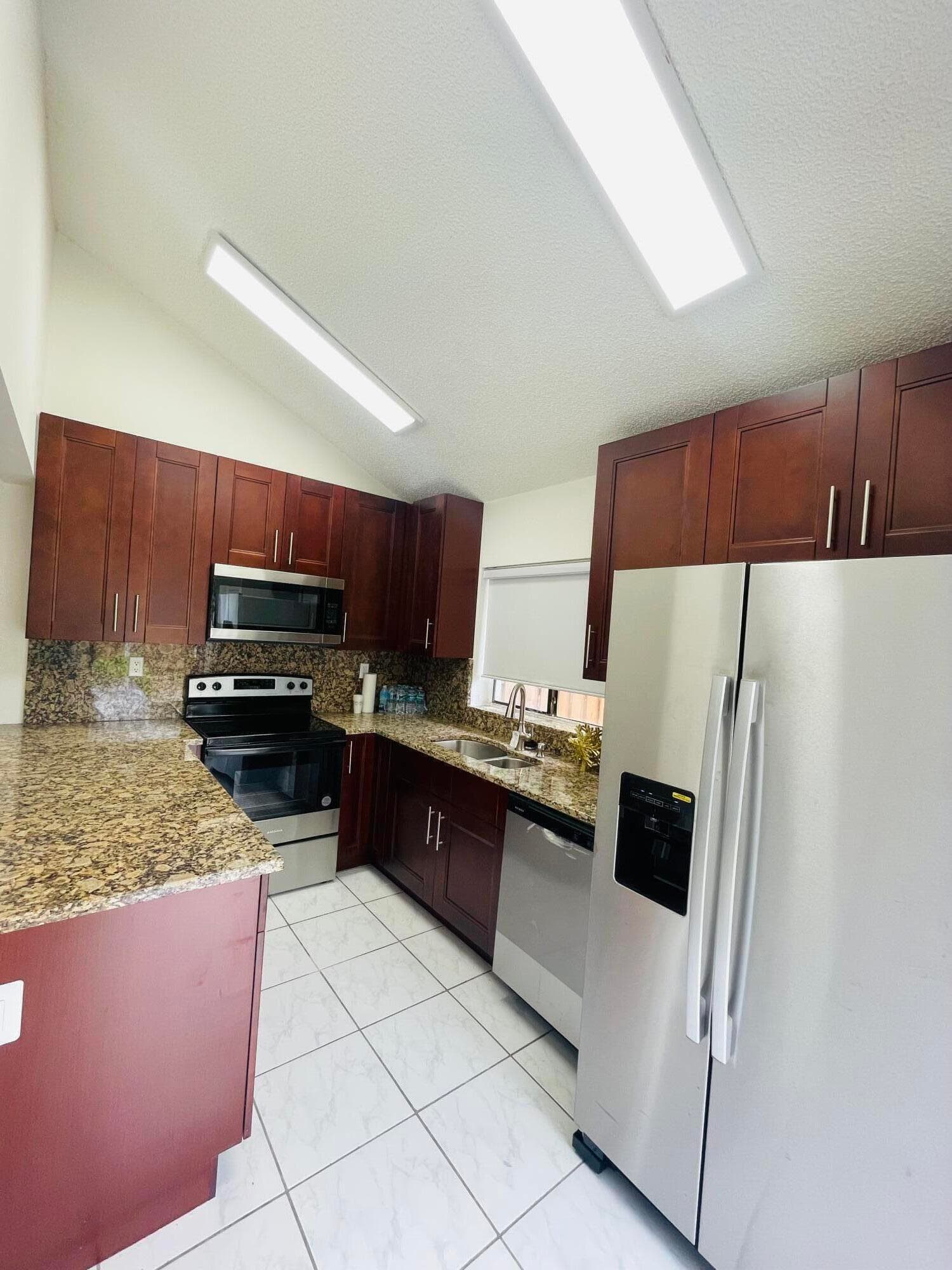 617 NW 132nd Terrace 617, Plantation, FL 33325 — photo 1 of 15