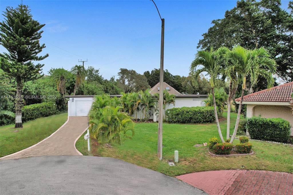 4808 Queen Palm Lane, Tamarac, FL 33319 — photo 1 of 35