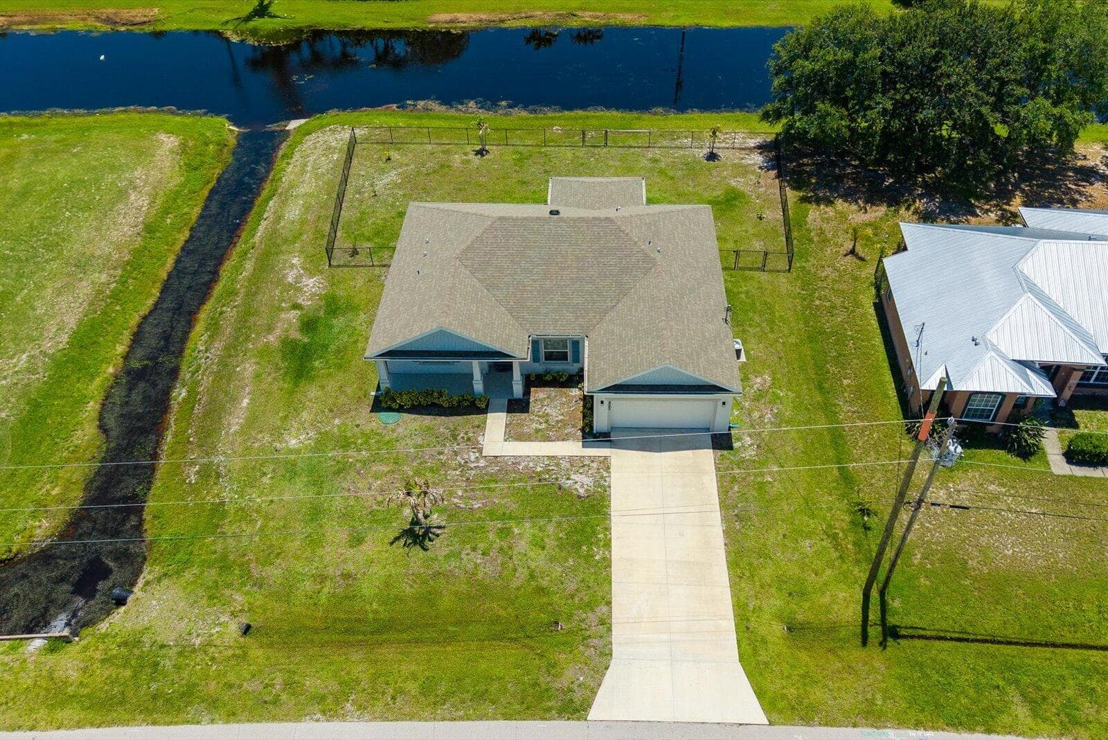 2063 SE South Buttonwood Drive, Port St. Lucie, FL 34952 — photo 34 of 35