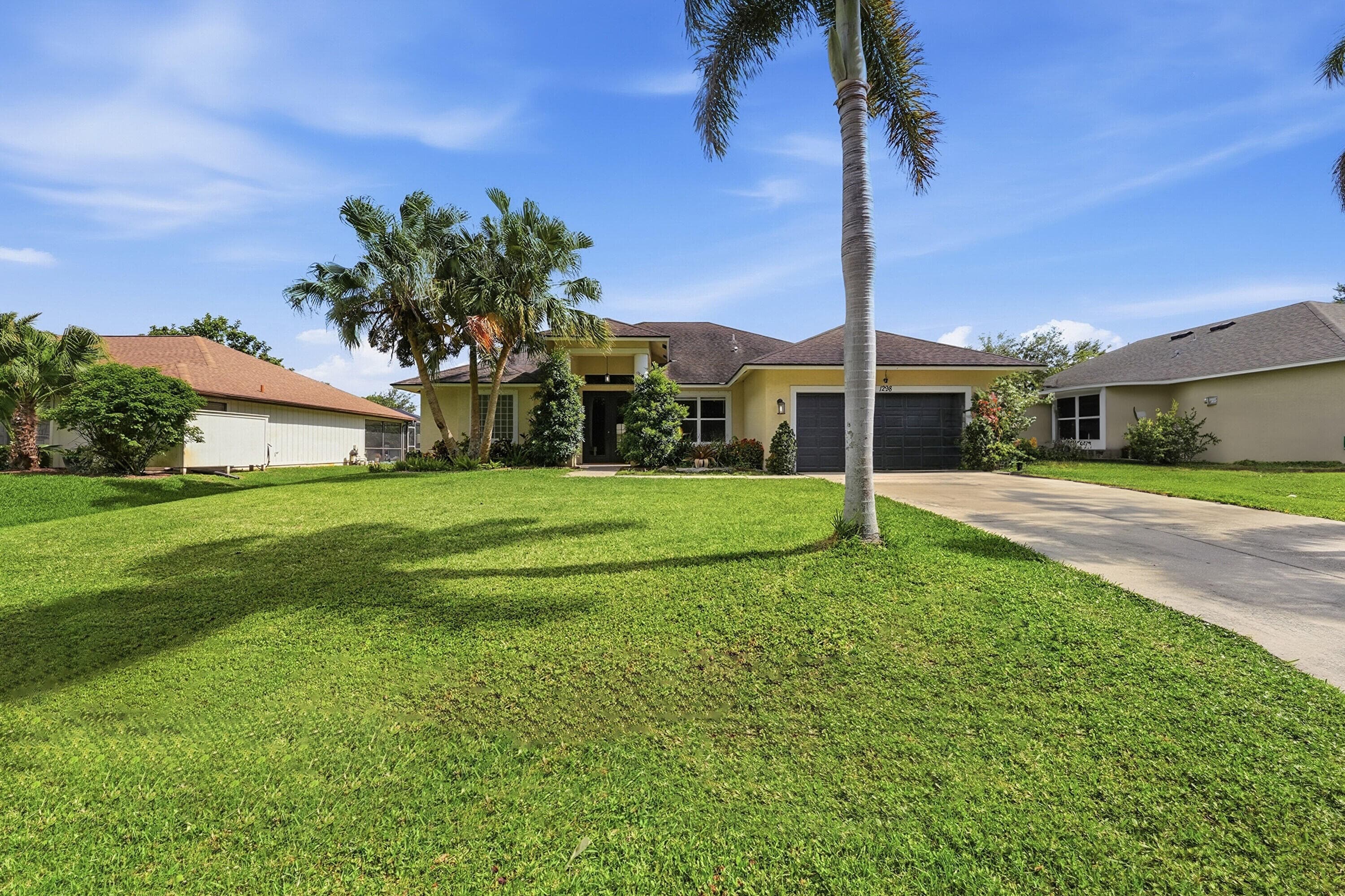 1298 SW Chase Road, Port St. Lucie, FL 34953 — photo 1 of 19