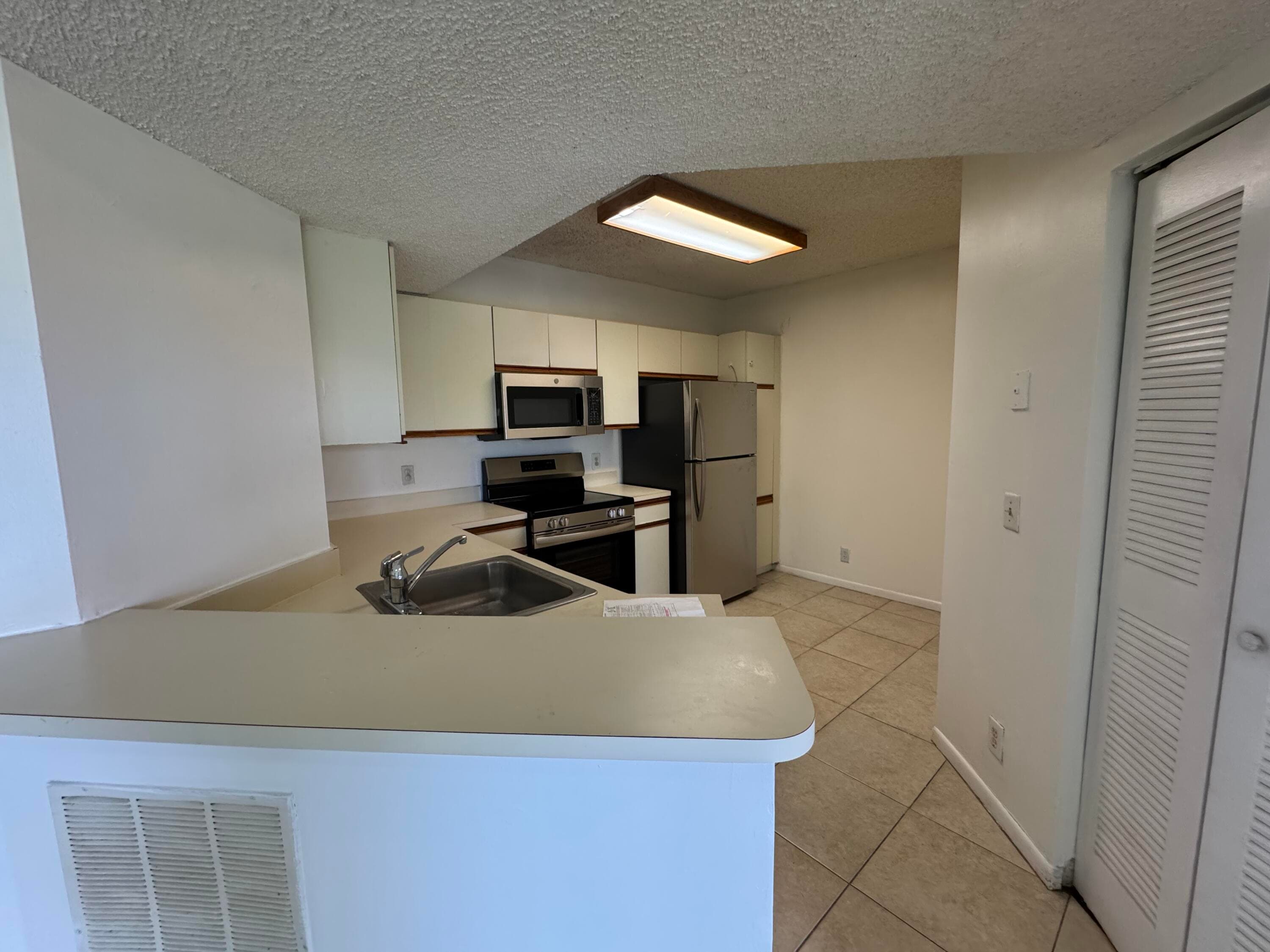 8891 Wiles Road 303, Coral Springs, FL 33067 — photo 7 of 10