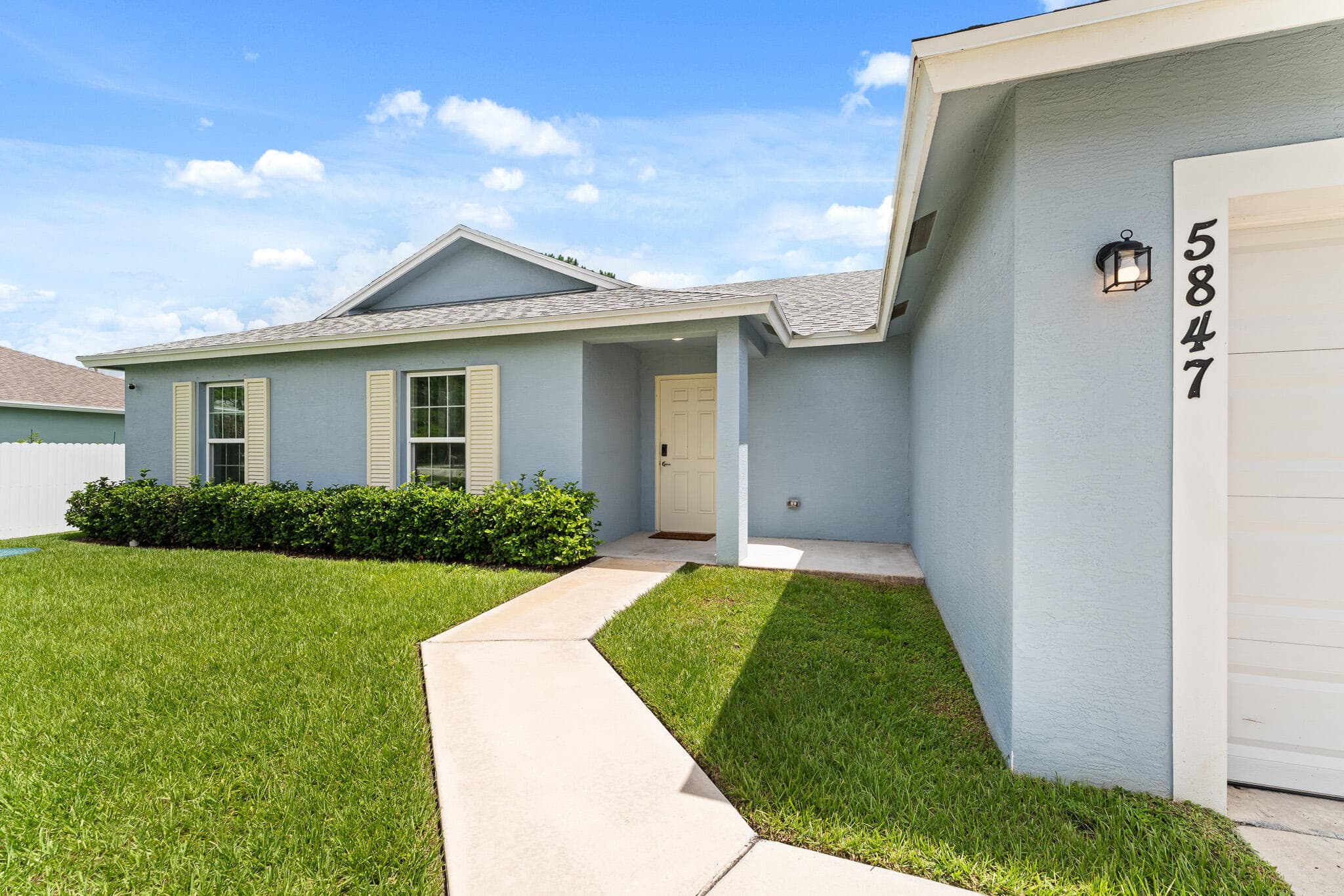 5847 NW Gillespie Avenue, Port St. Lucie, FL 34986 — photo 4 of 50