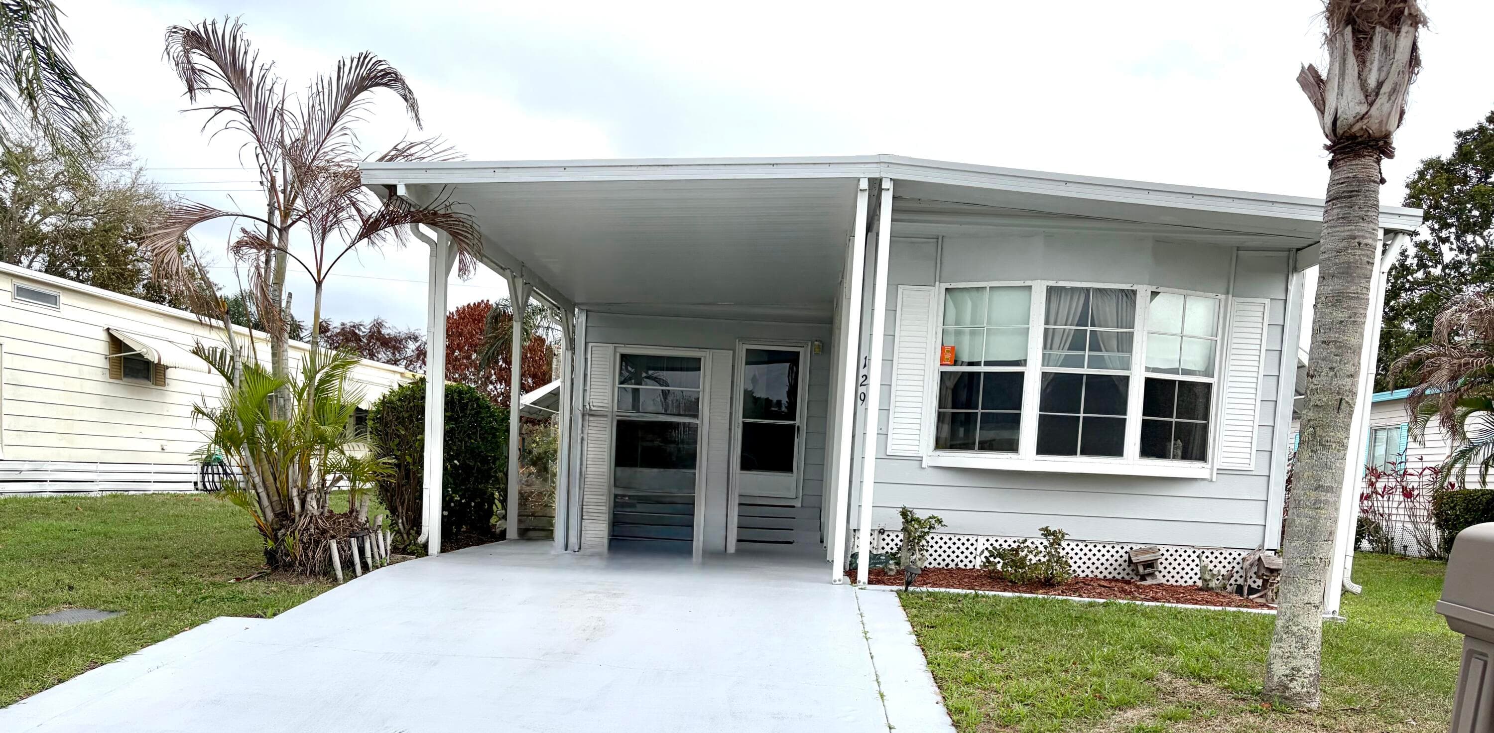 129 E Caribbean, Port St. Lucie, FL 34952 — photo 1 of 33