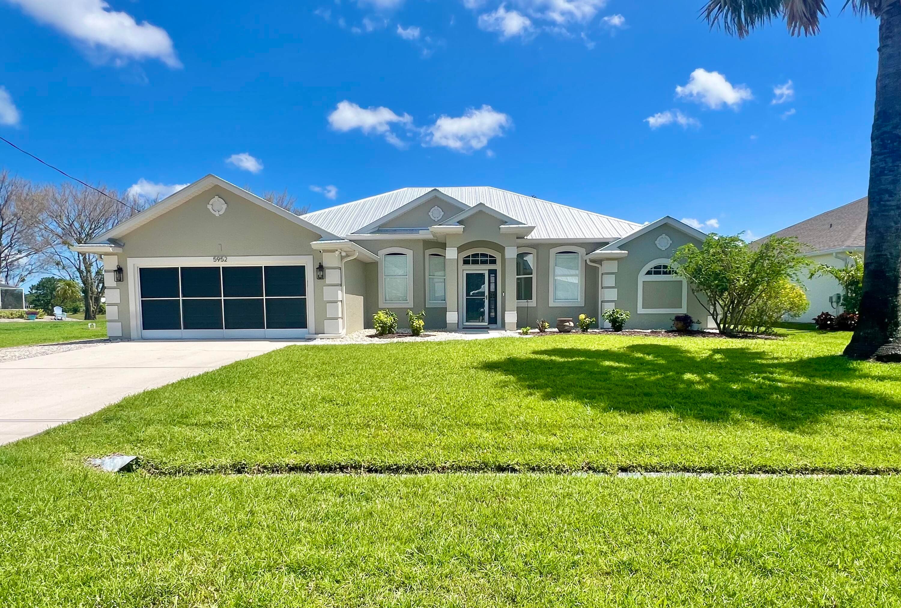 5952 NW Favian Avenue, Port St. Lucie, FL 34986 — photo 1 of 41