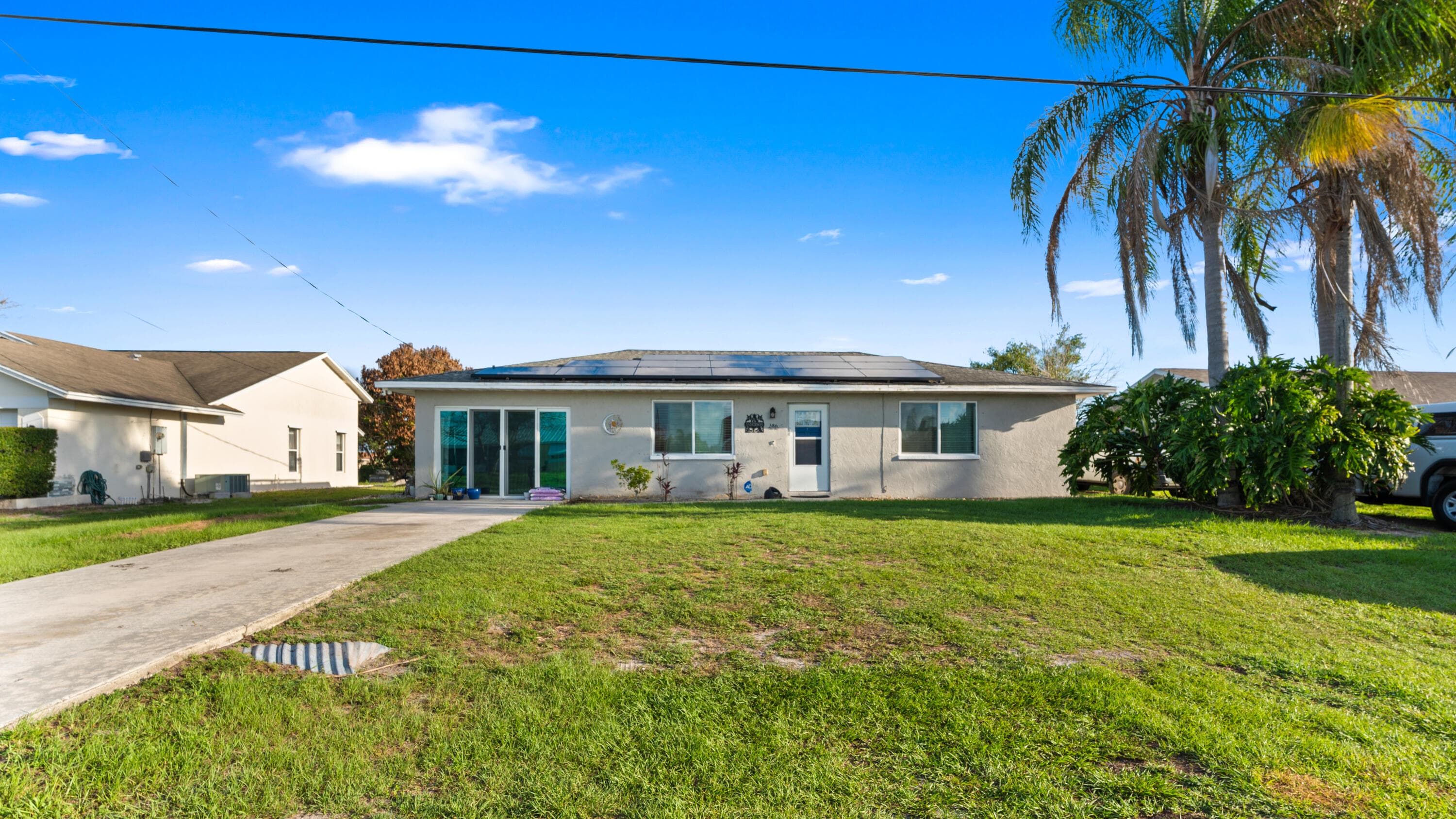 386 SE Oakridge Drive, Port St. Lucie, FL 34984 — photo 1 of 44