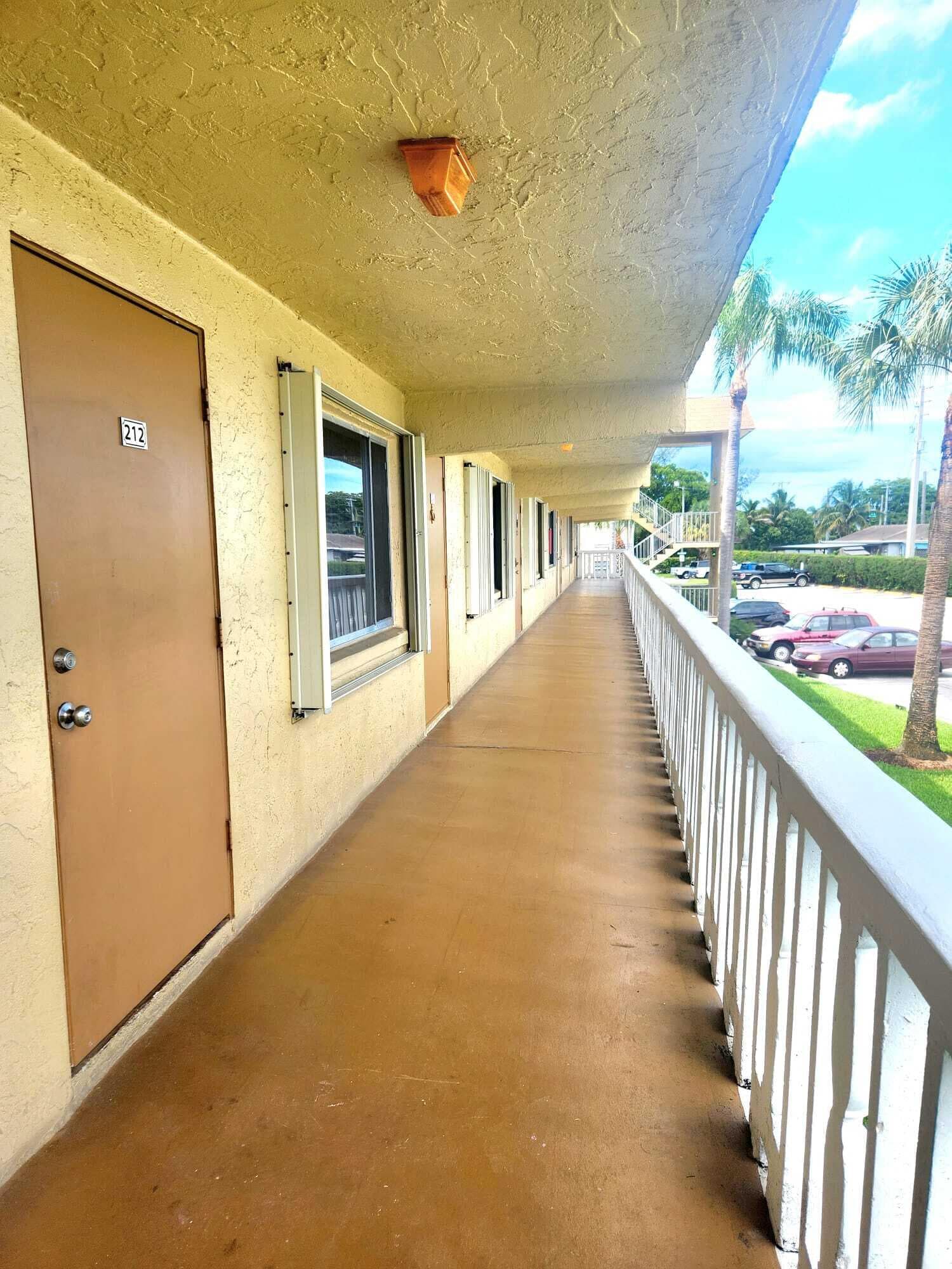 100 Village Green Circle E B212, Palm Springs, FL 33461 — photo 2 of 12
