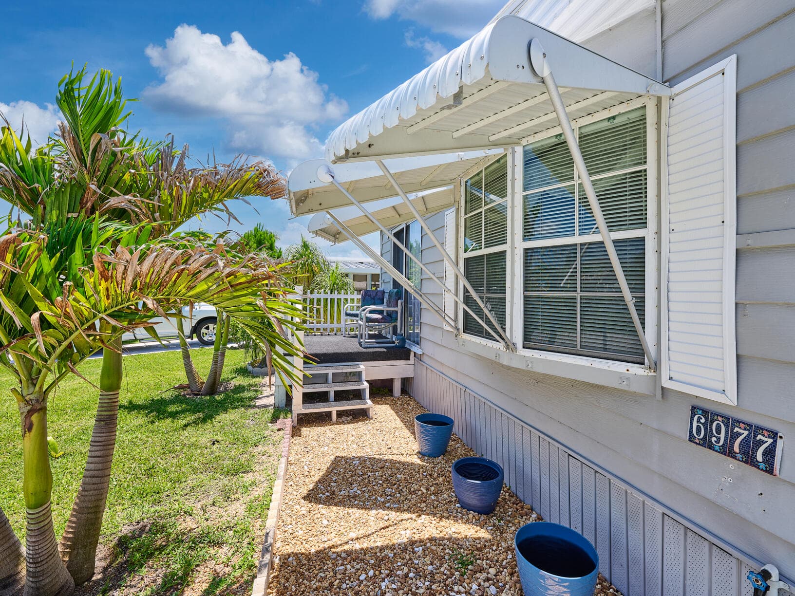 6977 SE Delegate Street, Hobe Sound, FL 33455 — photo 7 of 60