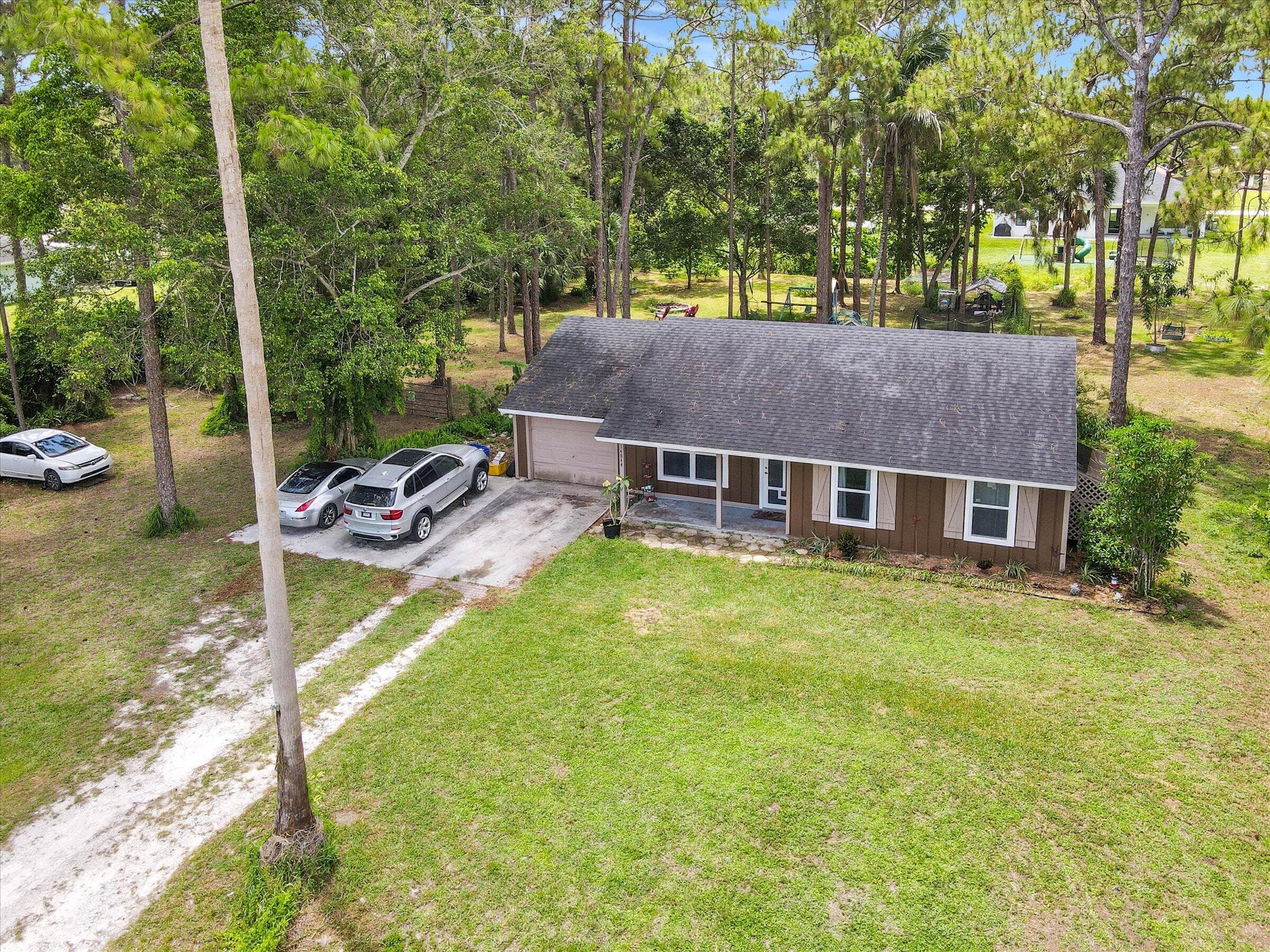 14844 N 63rd Ct Court N, The Acreage, FL 33470 — photo 2 of 44