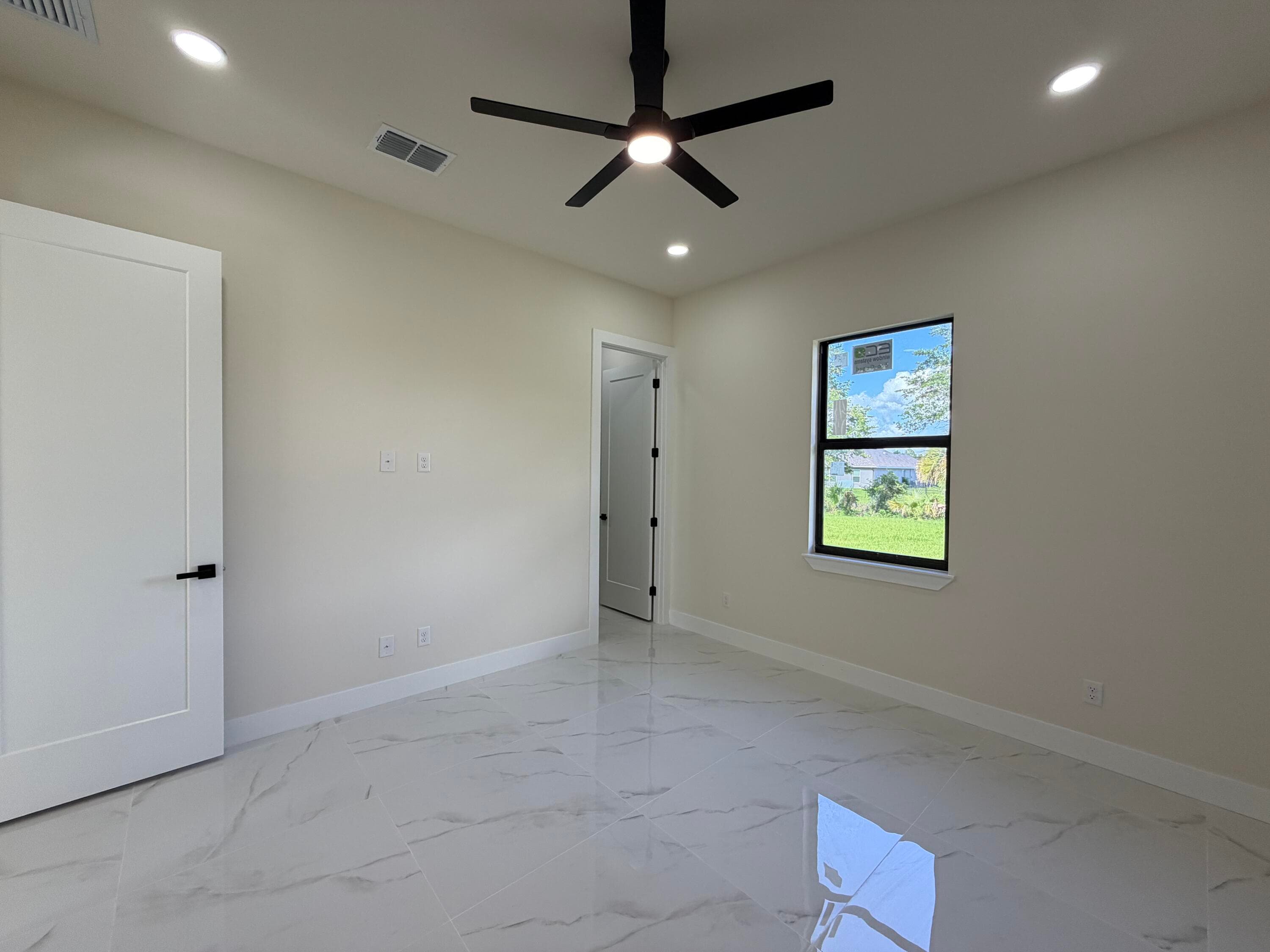 515 Kingsbury Lane, Lehigh Acres, FL 33974 — photo 9 of 21