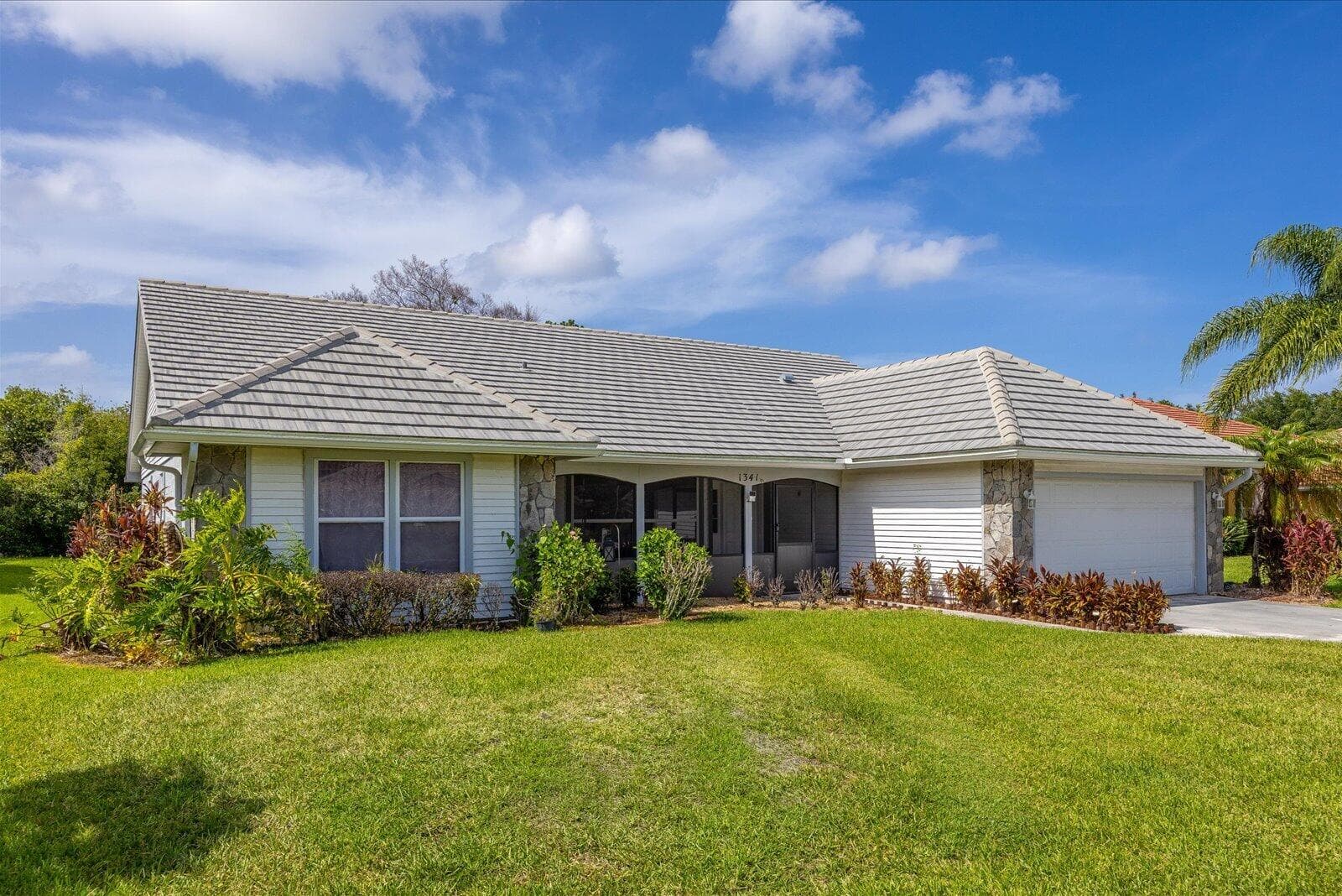 1341 SW Maplewood Drive, Port St. Lucie, FL 34986 — photo 3 of 41