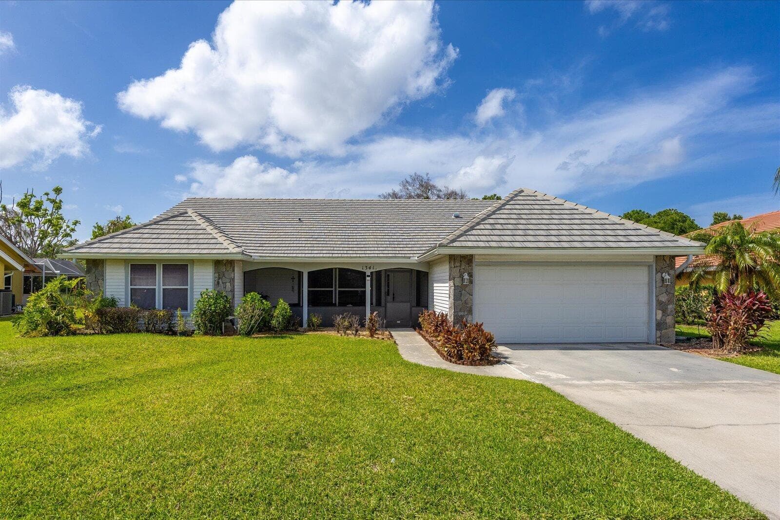 1341 SW Maplewood Drive, Port St. Lucie, FL 34986 — photo 1 of 41