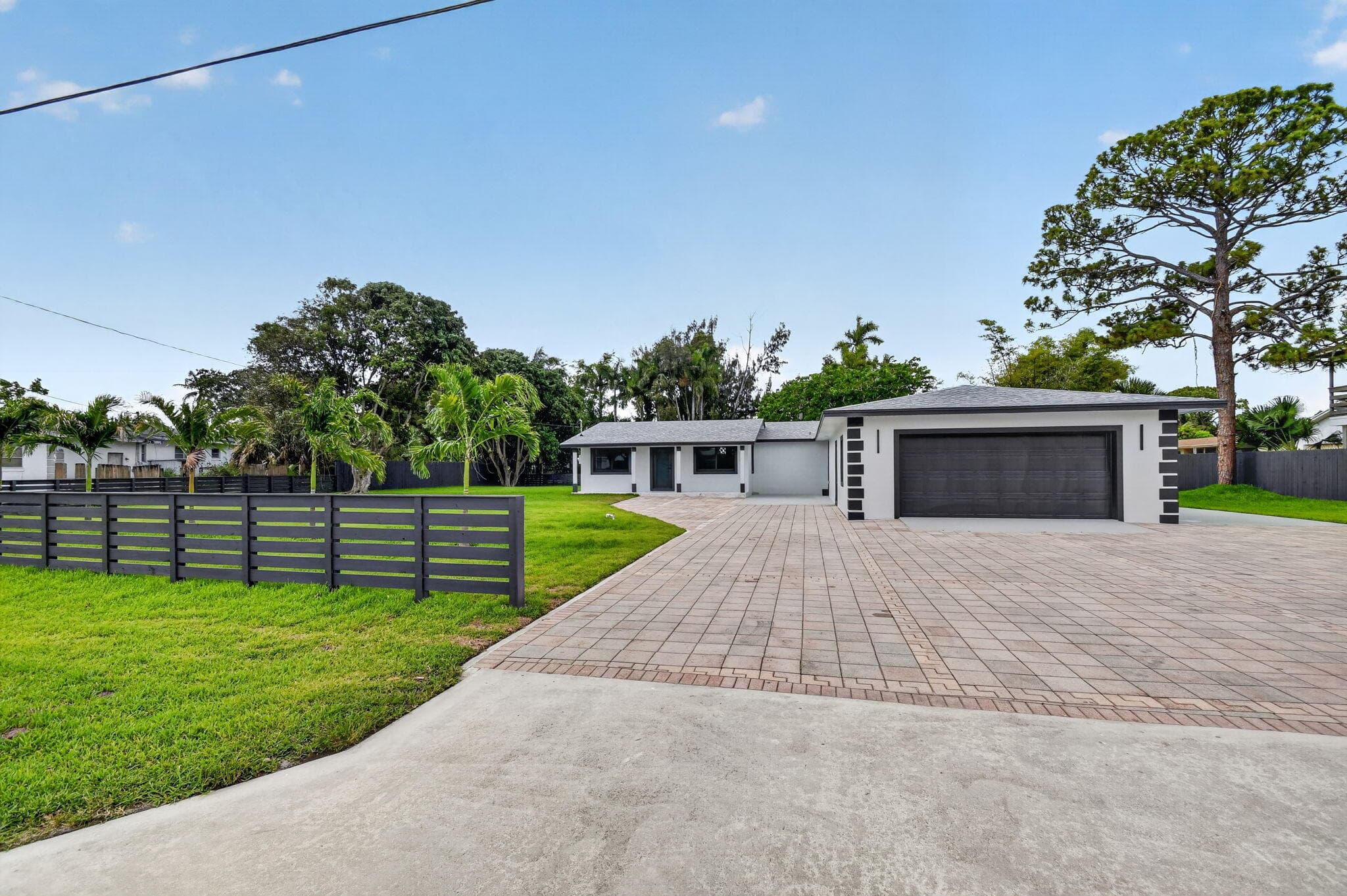 3192 Riddle Road, West Palm Beach, FL 33406 — photo 2 of 74