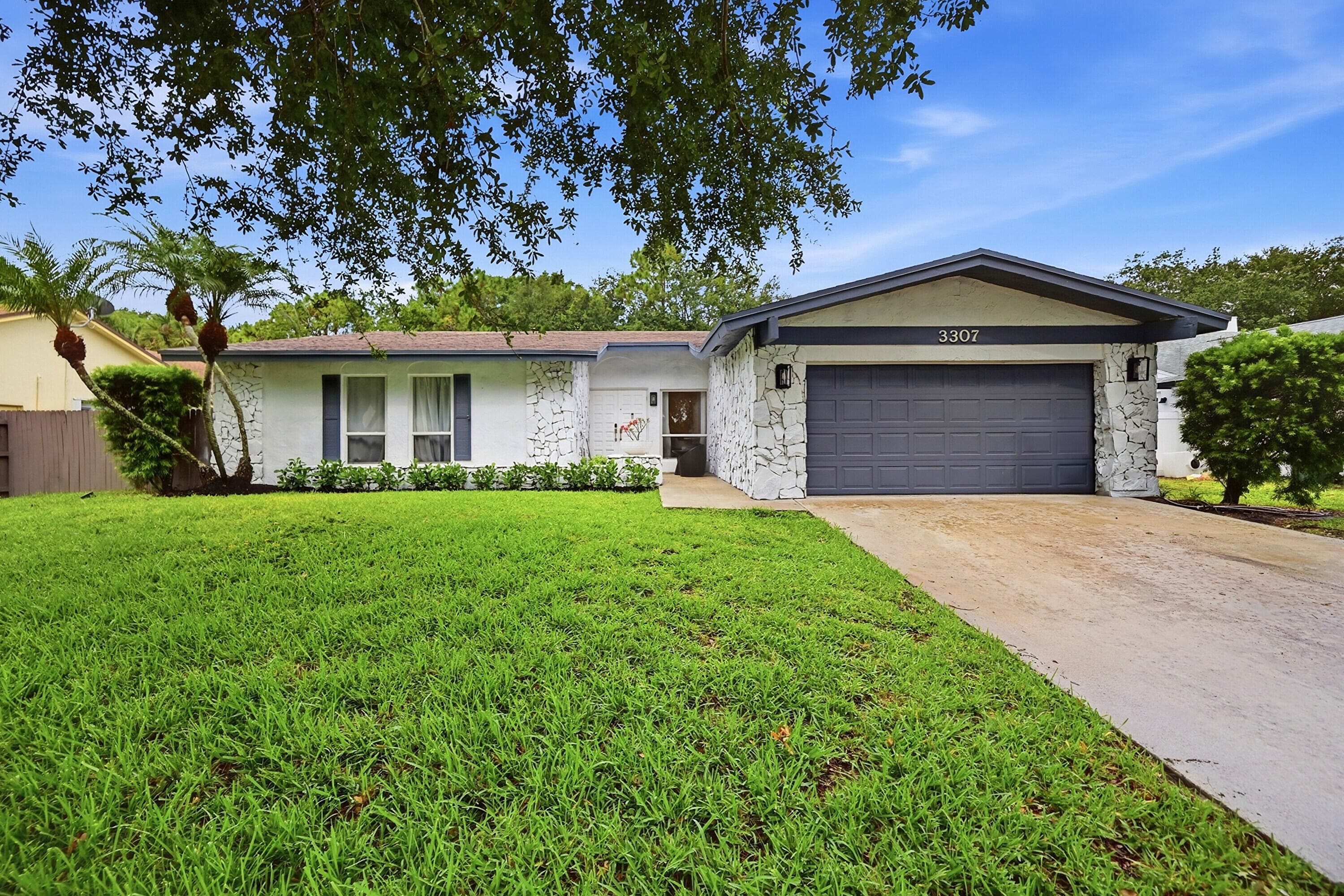 3307 NW 29th Avenue, Boca Raton, FL 33434 — photo 1 of 49