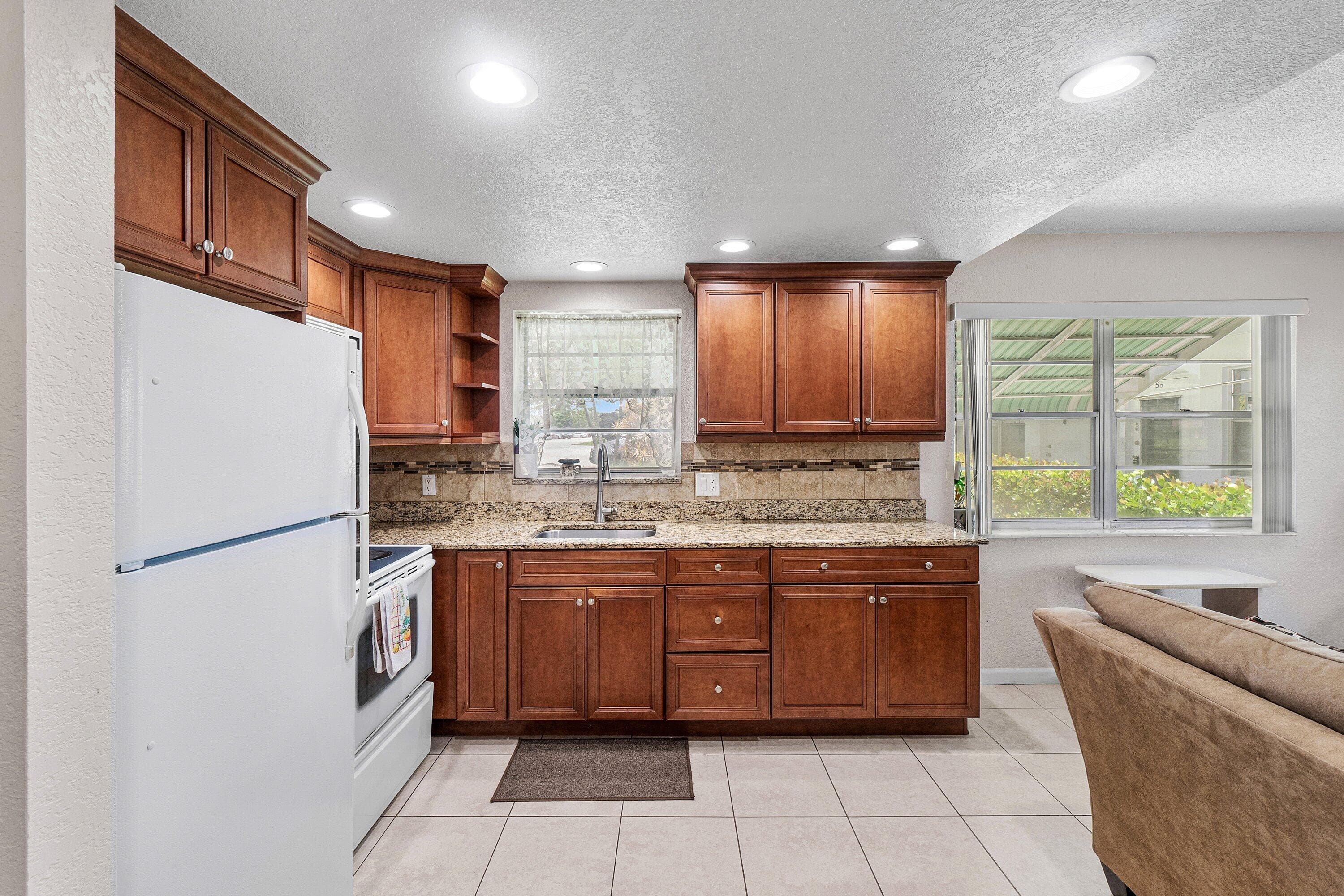 57 Canterbury, West Palm Beach, FL 33417 — photo 12 of 25