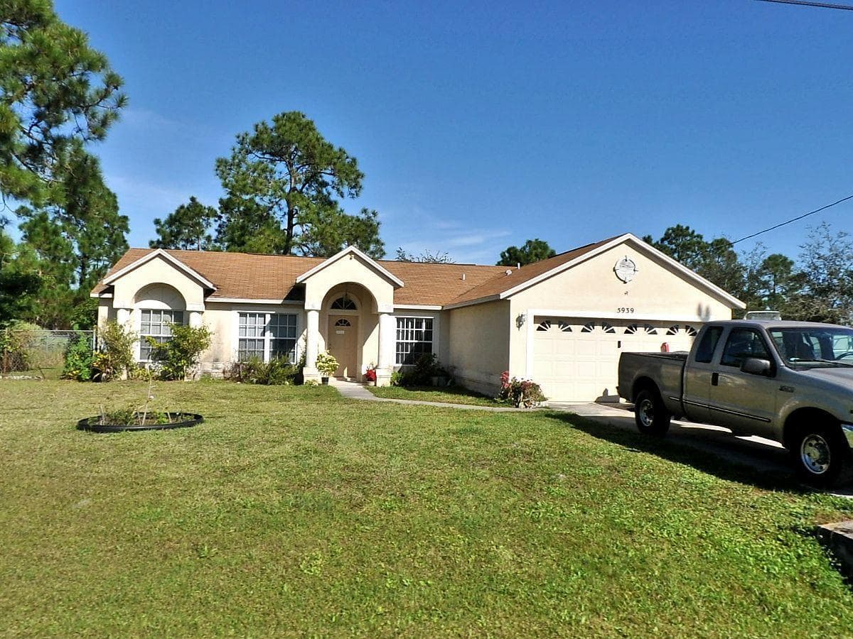 5939 NW Foust Circle, Port St. Lucie, FL 34986 — photo 1 of 35