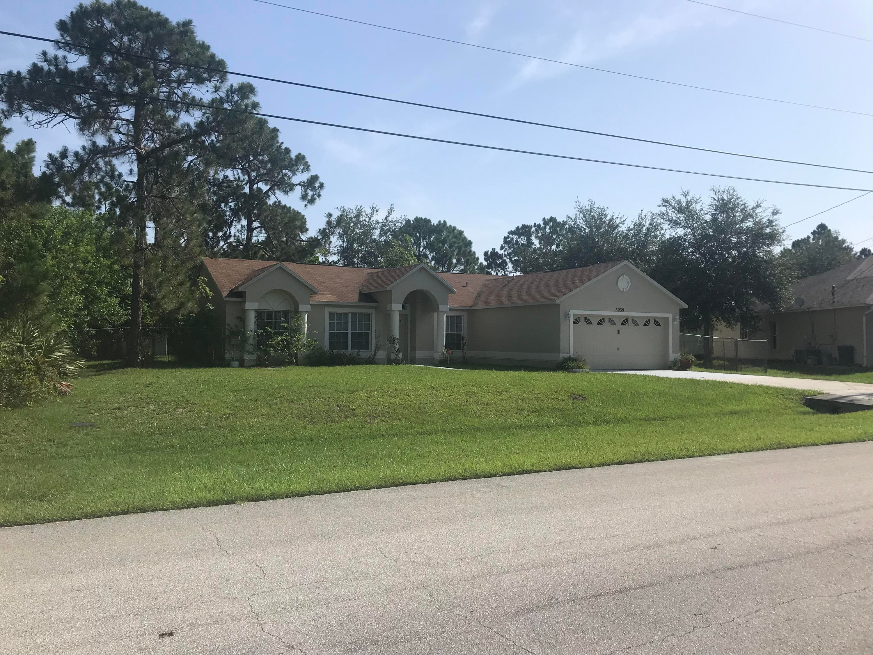 5939 NW Foust Circle, Port St. Lucie, FL 34986 — photo 2 of 35