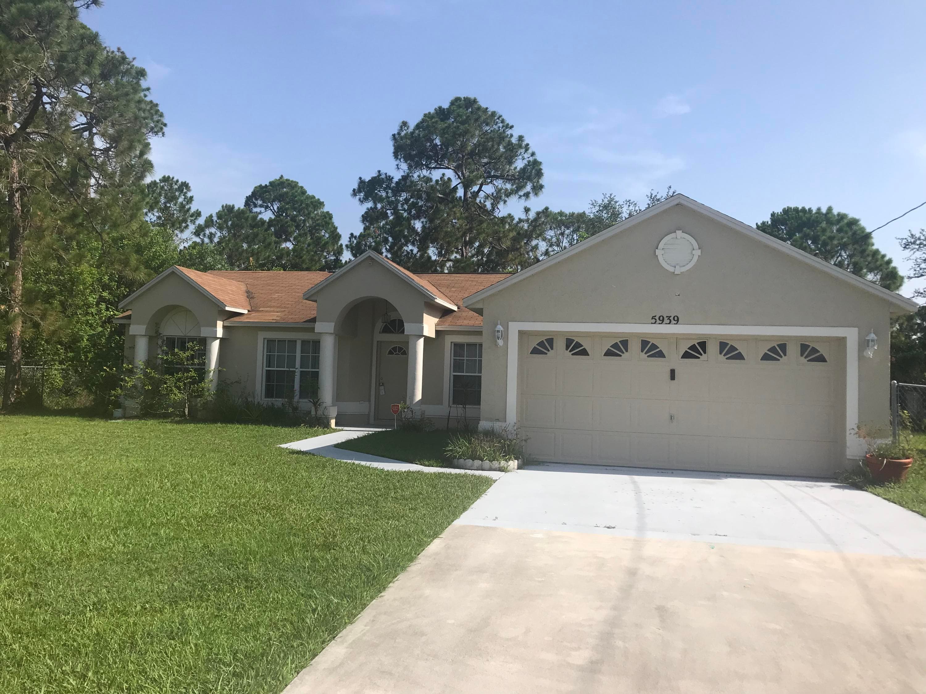 5939 NW Foust Circle, Port St. Lucie, FL 34986 — photo 3 of 35