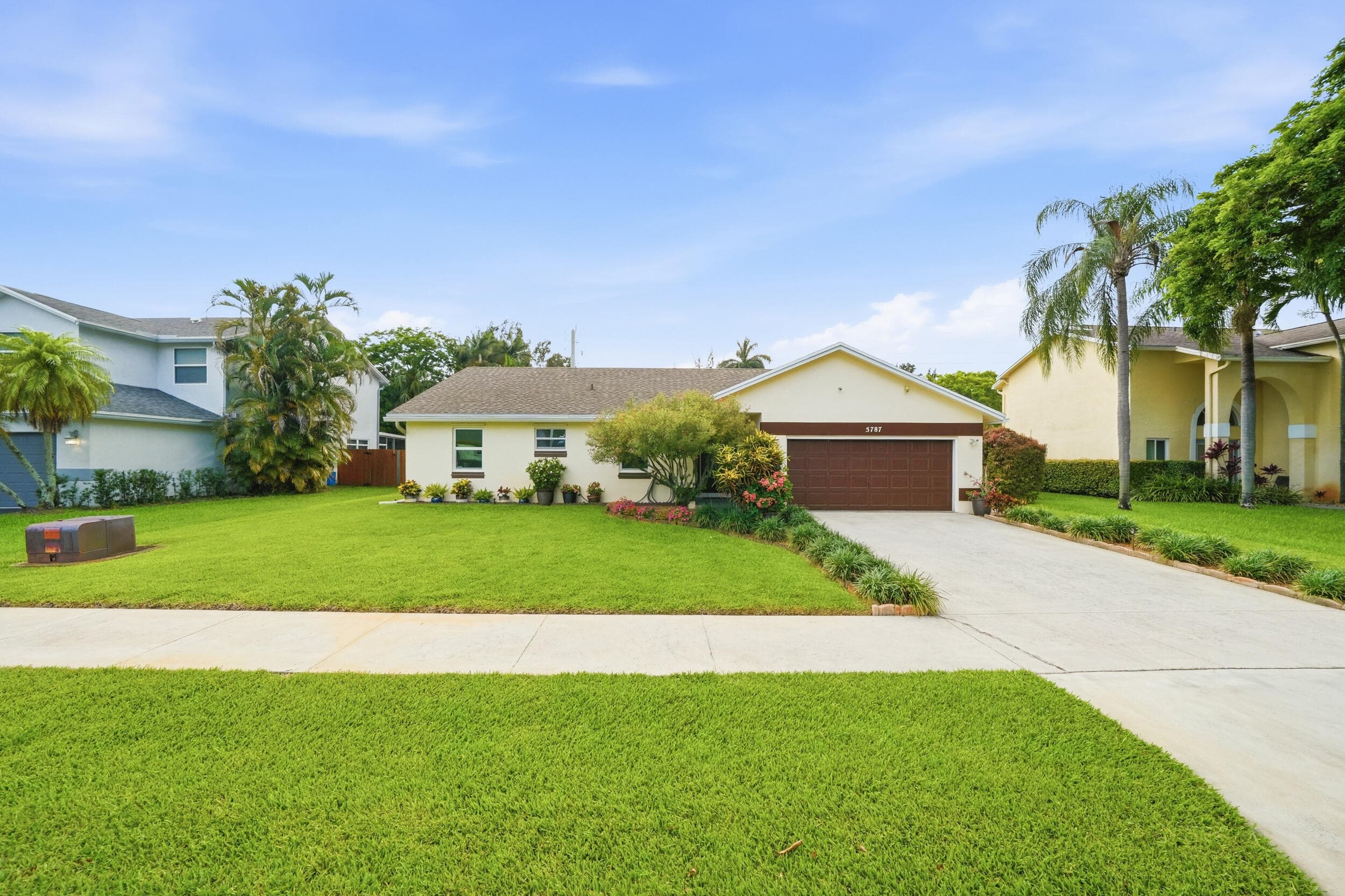 5787 SW 57th Way, Davie, FL 33314 — photo 1 of 40