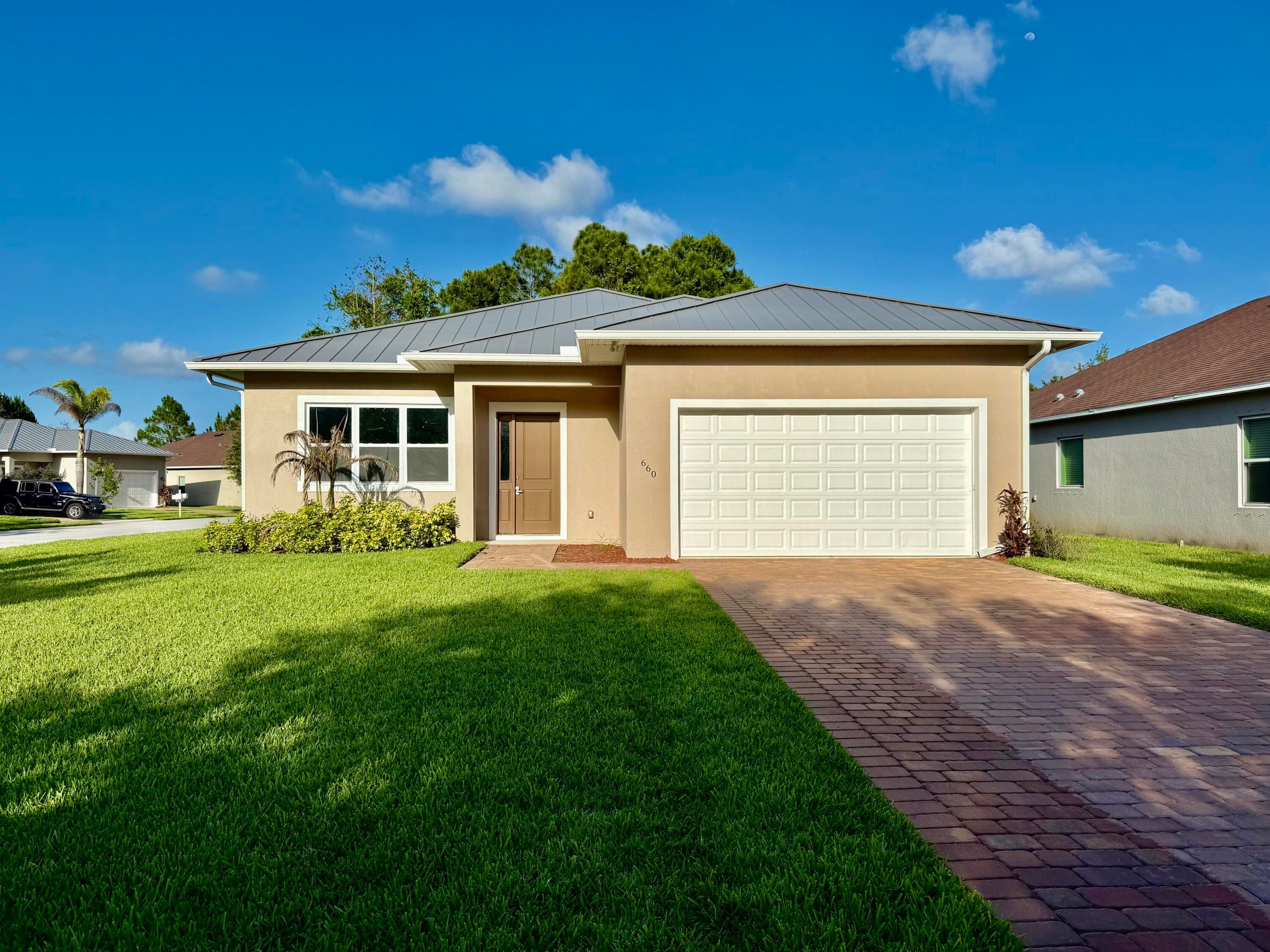 660 NE Moss Rose Place, Port St. Lucie, FL 34983 — photo 1 of 20