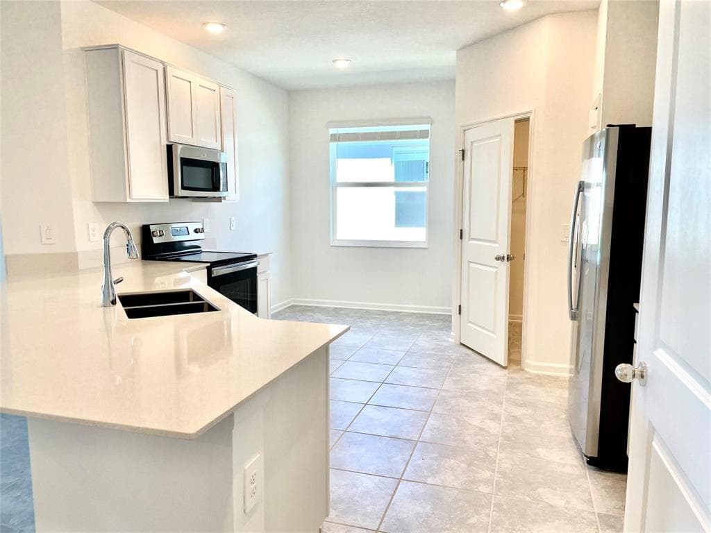 316 Heroic Road, Davenport, FL 33837 — photo 7 of 18