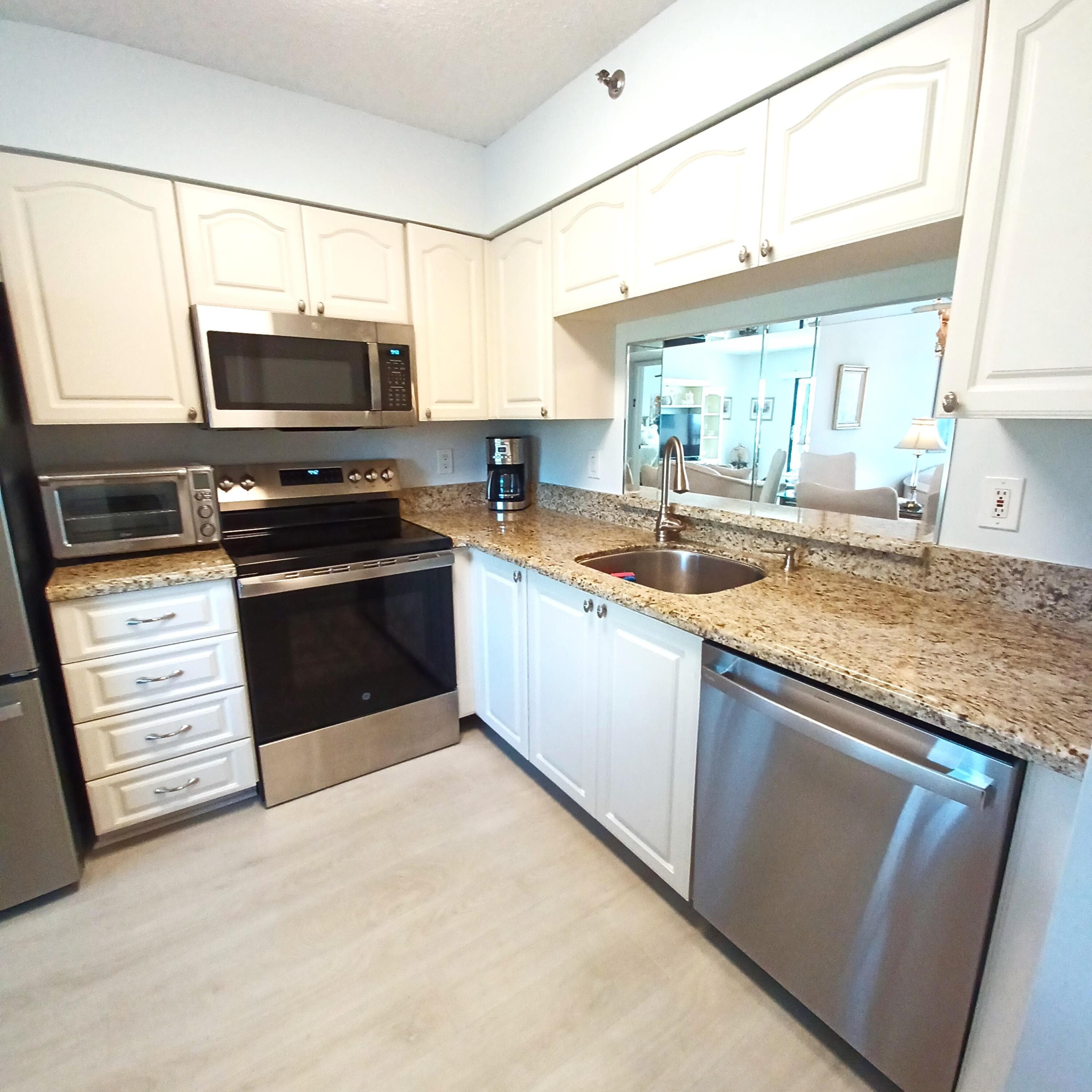 7260 Kinghurst Drive 406, Delray Beach, FL 33446 — photo 6 of 92