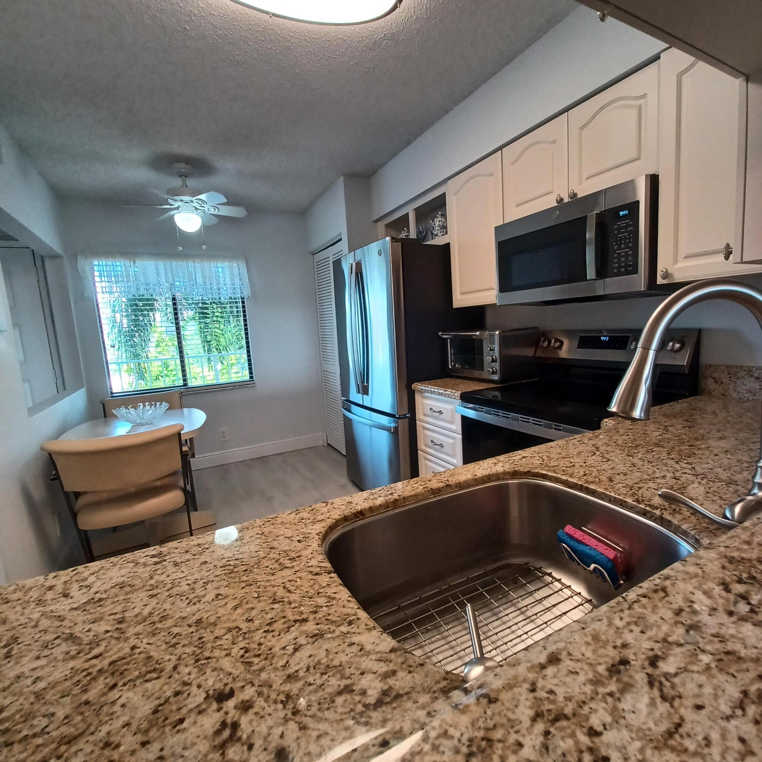 7260 Kinghurst Drive 406, Delray Beach, FL 33446 — photo 10 of 92
