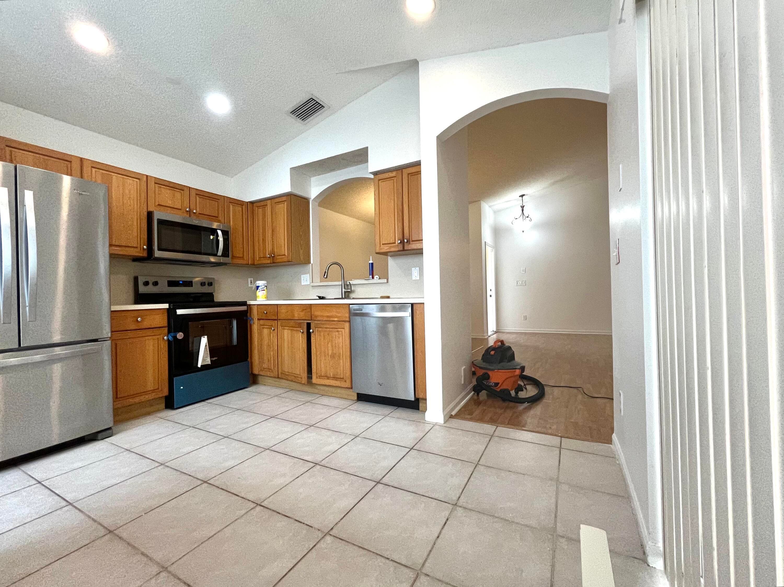 7063 Burgess Drive, Greenacres, FL 33467 — photo 3 of 5