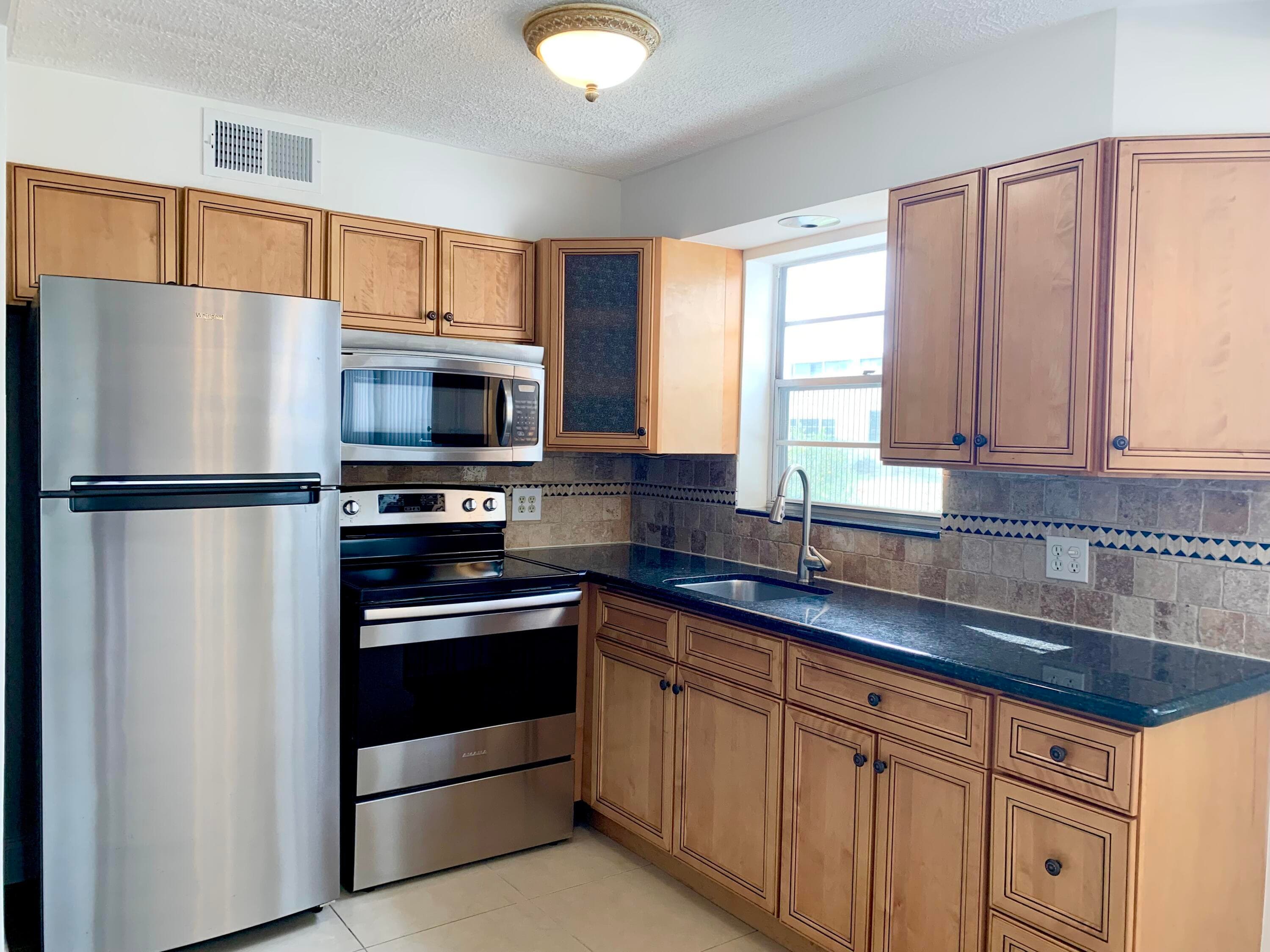 130 Sheffield F, West Palm Beach, FL 33417 — photo