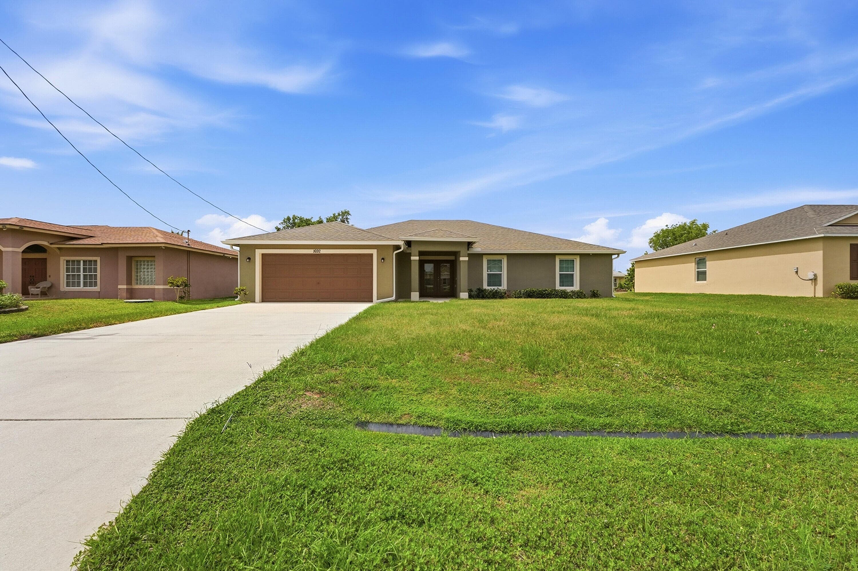 1692 SW Alvaton Avenue, Port St. Lucie, FL 34953 — photo 2 of 37