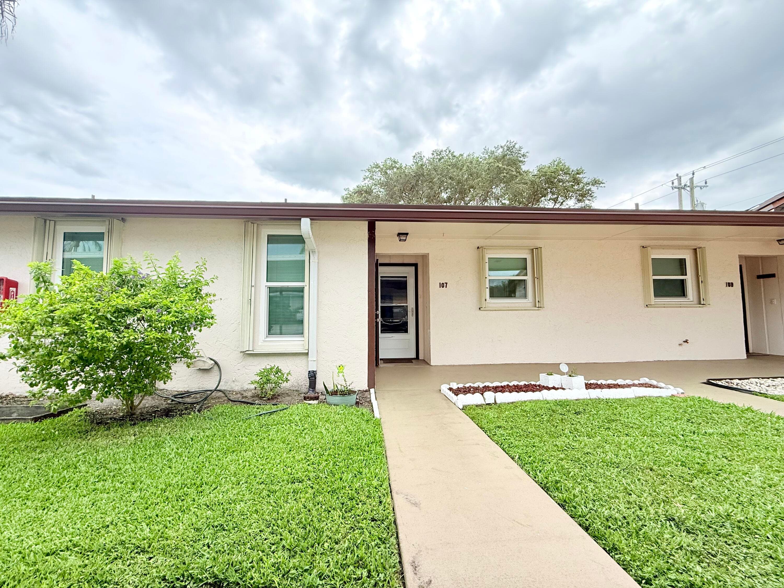 6531 SE Federal Hwy G-107, Stuart, FL 34997 — photo 1 of 37