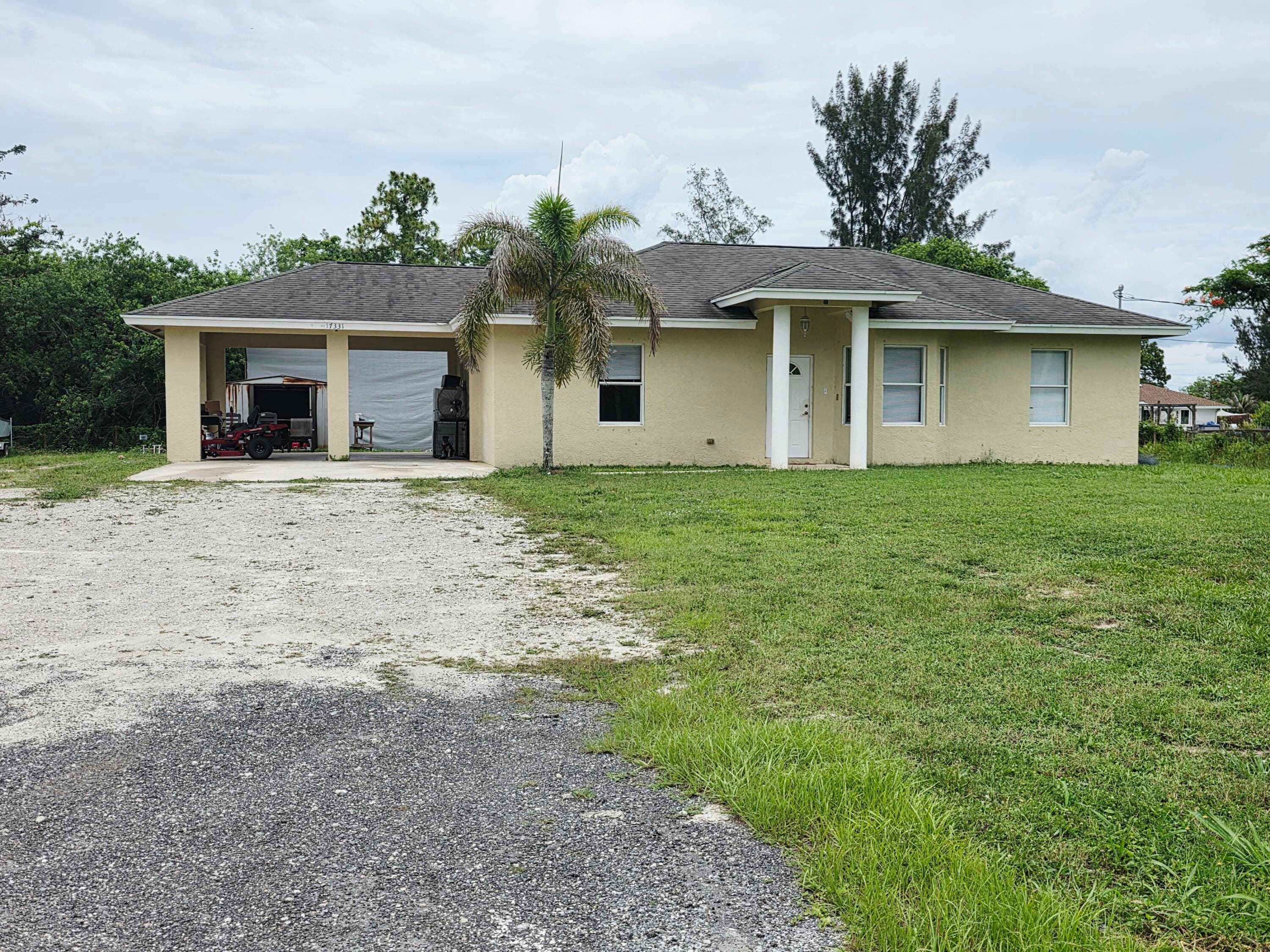 17331 38th Road N, The Acreage, FL 33470 — photo 1 of 39