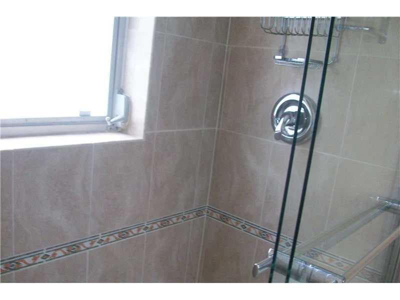 4031 N Cypress Drive 101, Pompano Beach, FL 33069 — photo 11 of 35