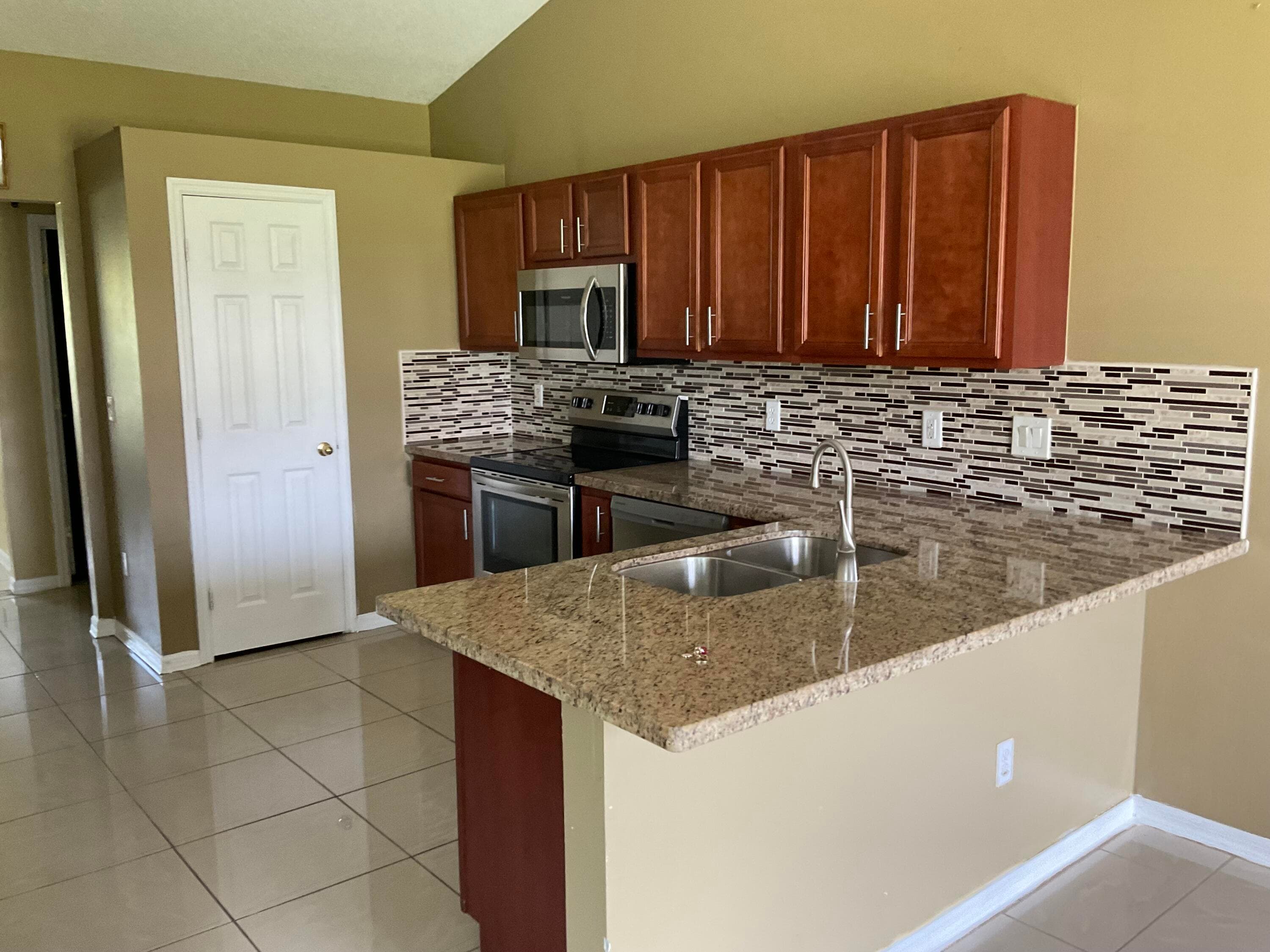 688 SW Heather Street, Port St. Lucie, FL 34983 — photo 10 of 19