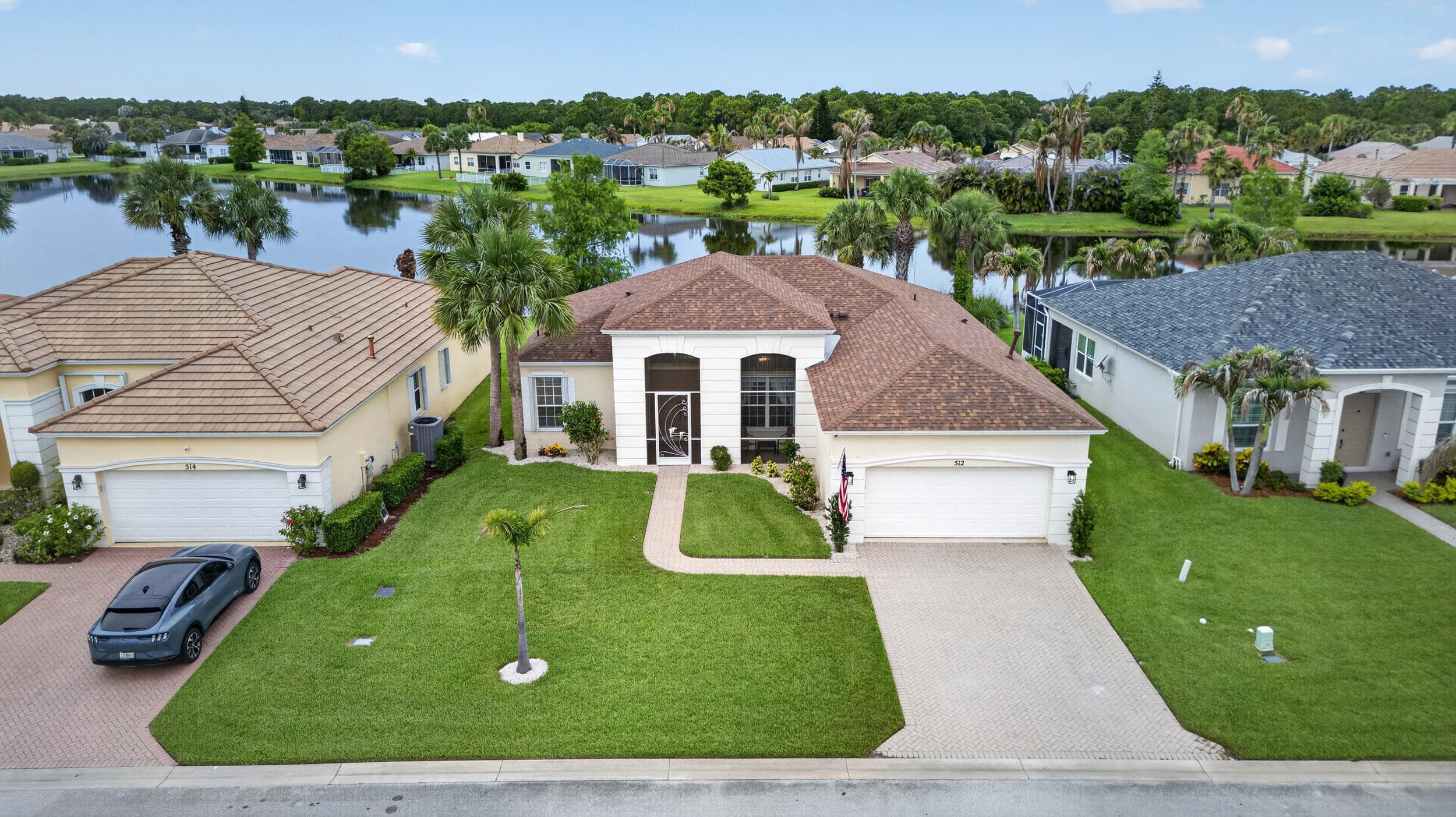 512 SW Lake Manatee Way, FL 34986 — photo 1 of 76