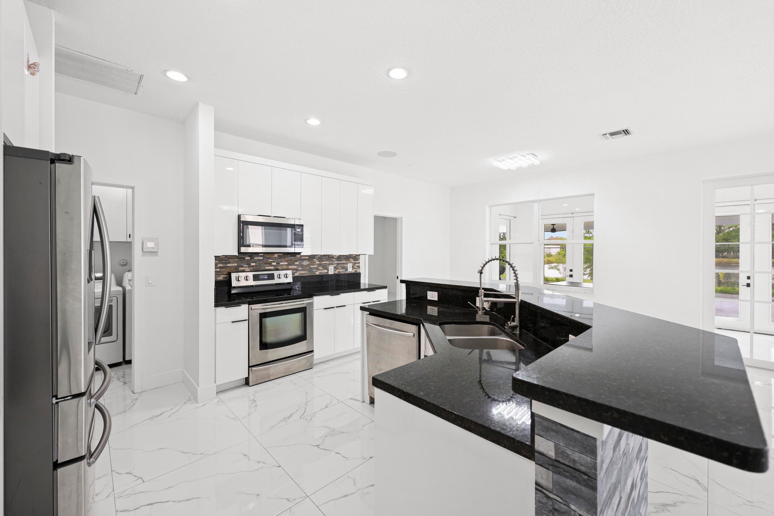 1209 Olympic Circle, Greenacres, FL 33413 — photo 15 of 56