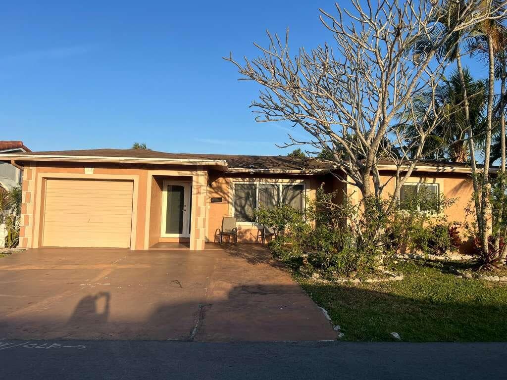 6100 NW 73rd Terrace, Tamarac, FL 33321 — photo 1 of 6