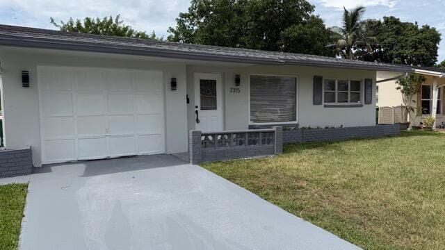 7315 NW 57th Place, Tamarac, FL 33321 — photo 1 of 13