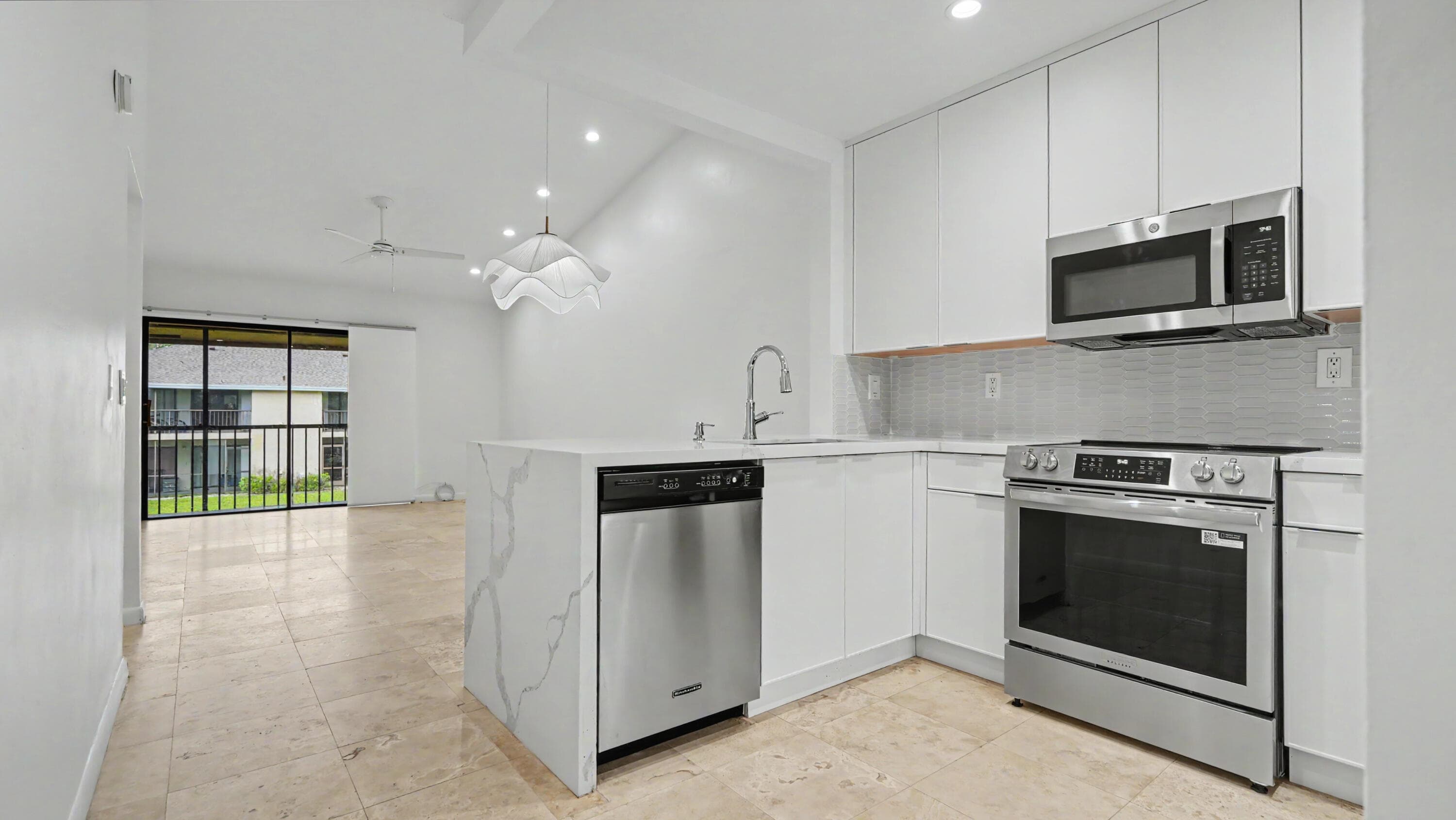 3939 NE 5th Avenue A201, Boca Raton, FL 33431 — photo 1 of 44