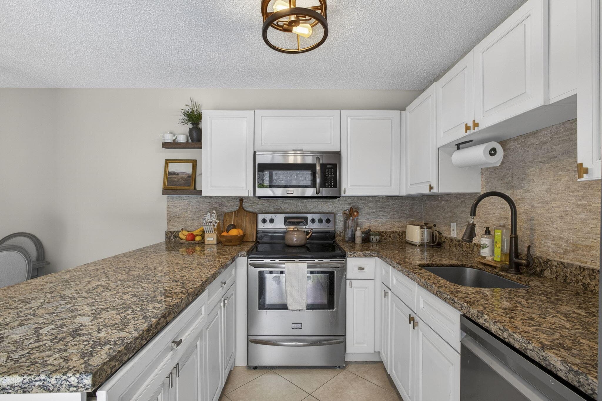 121 1st Terrace, Palm Beach Gardens, FL 33418 — photo 1 of 65