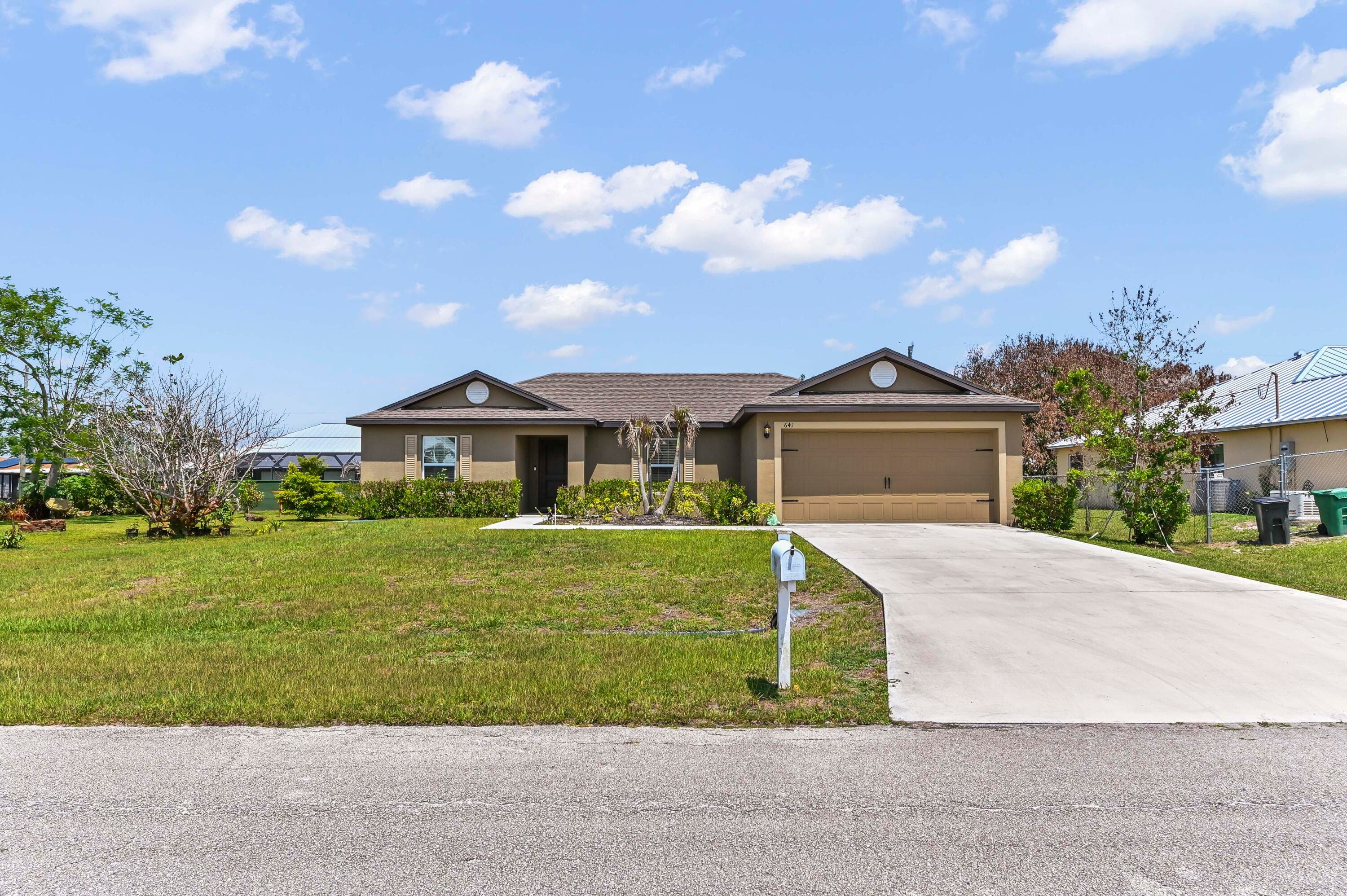641 SW Addie Street, Port St. Lucie, FL 34983 — photo 1 of 19