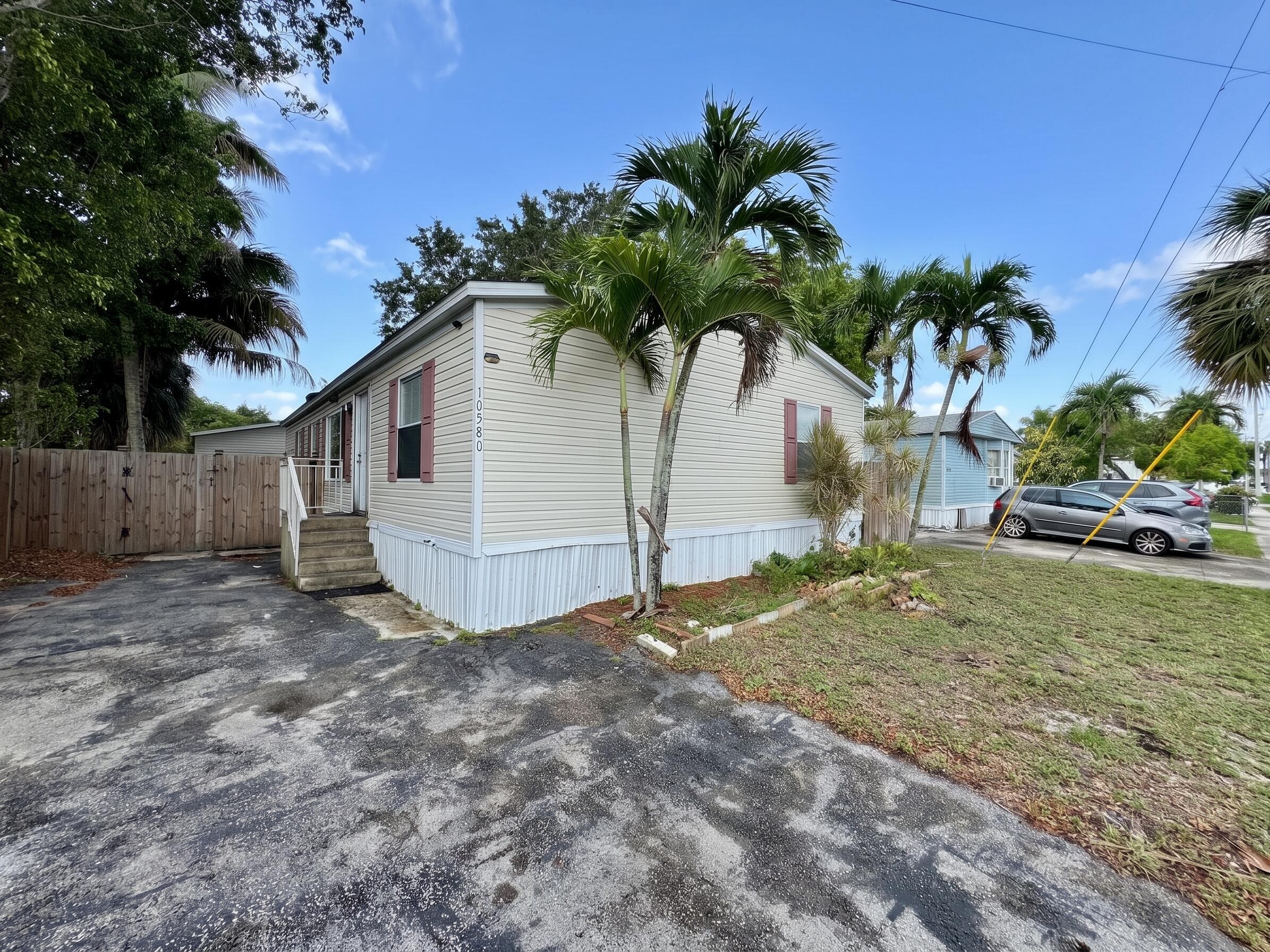 10580 Sandalfoot Boulevard, Boca Raton, FL 33428 — photo 1 of 15