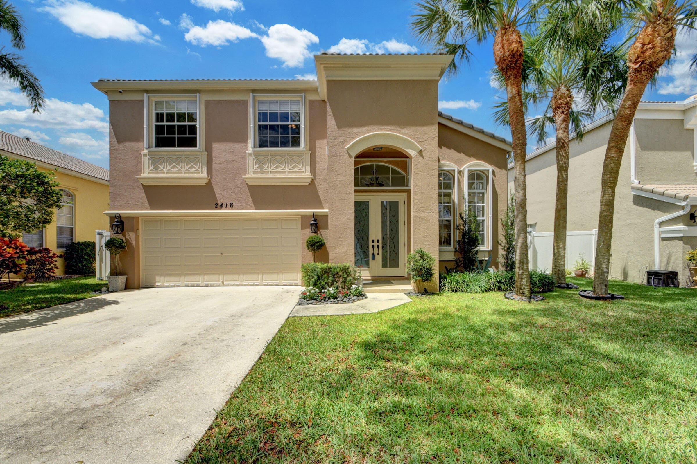 2418 Westmont Drive, Royal Palm Beach, FL 33411 — photo 2 of 54