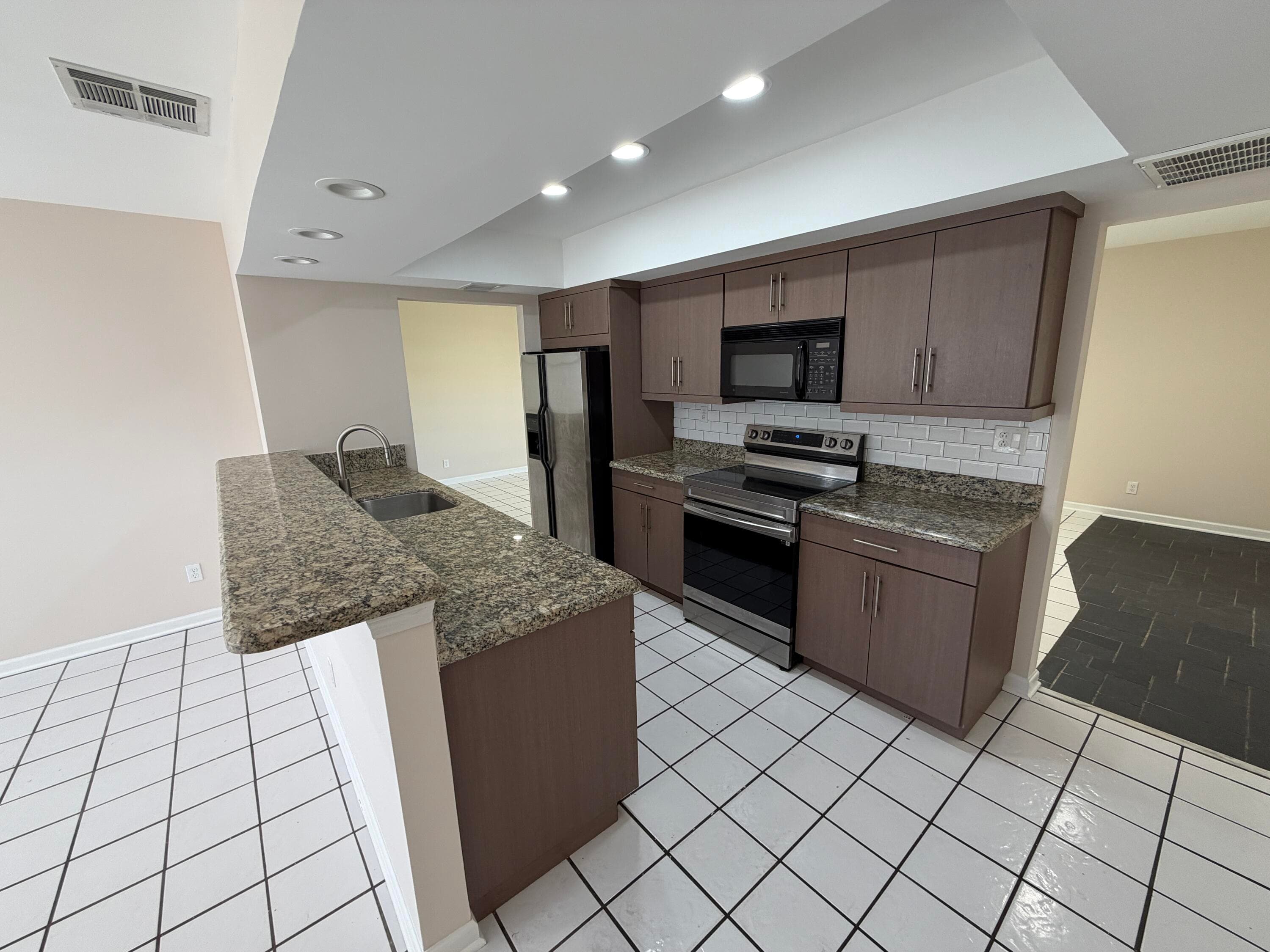 499 W Conference Drive, Boca Raton, FL 33486 — photo 1 of 31